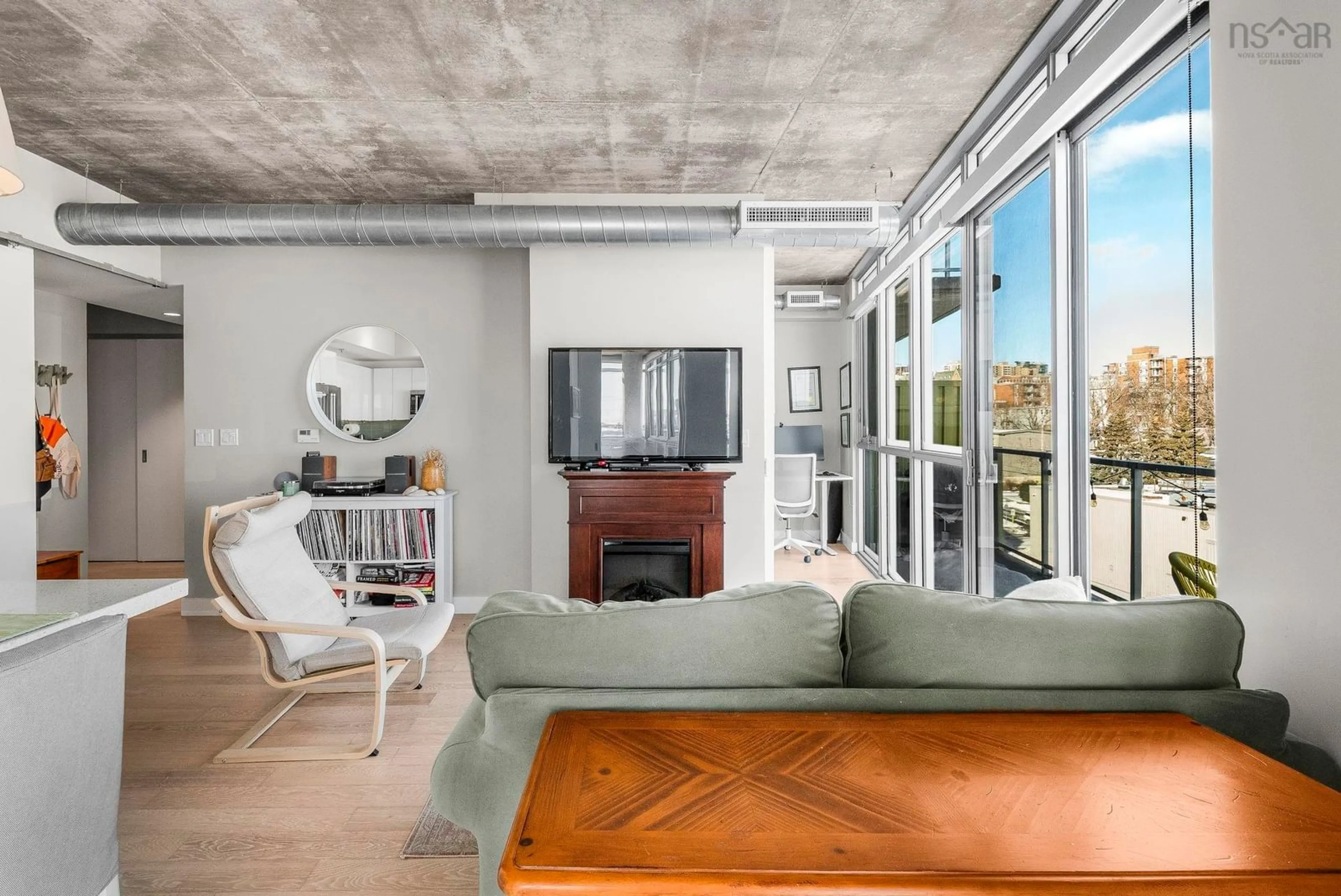 Living room with furniture, cement floor for 1065 Barrington St #508, Halifax Nova Scotia B3H 0B7