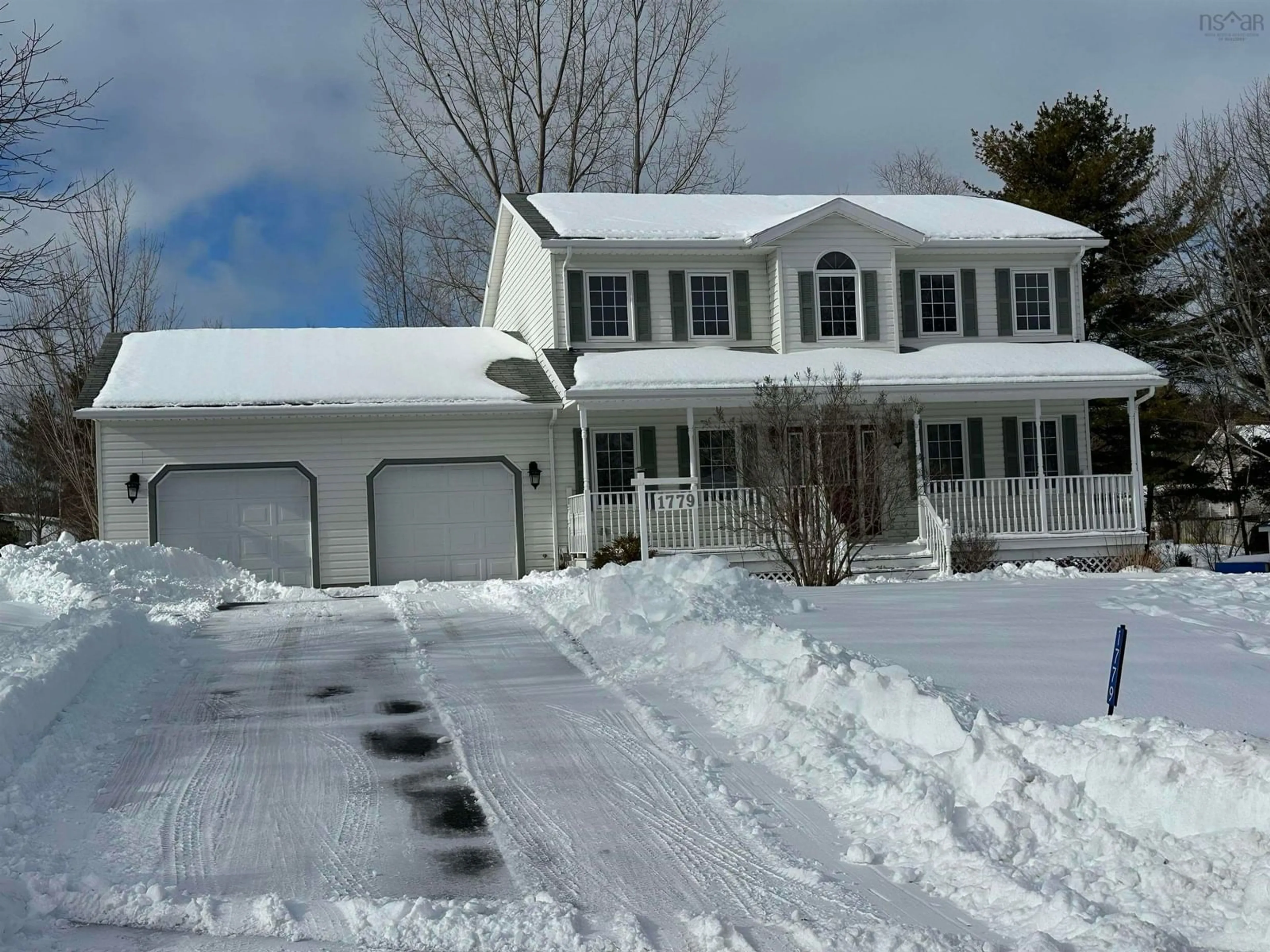 Home with vinyl exterior material, street for 1779 Drummond Dr, Kingston Nova Scotia B0P 1R0