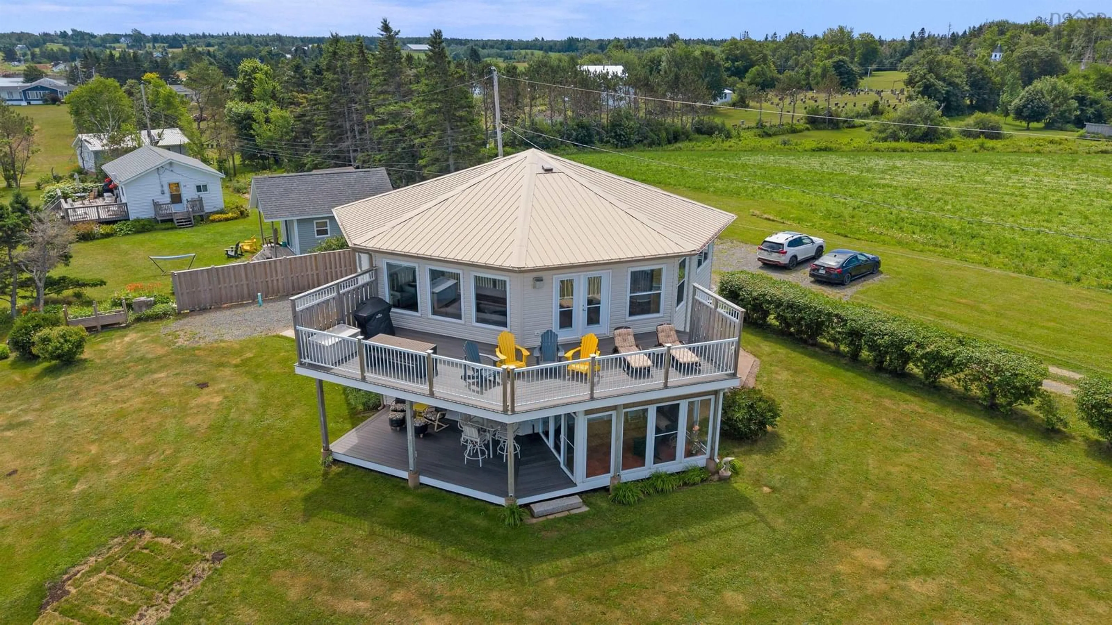 A pic from outside/outdoor area/front of a property/back of a property/a pic from drone, water/lake/river/ocean view for 51 Chapman Lane, Lorneville Nova Scotia B4H 3X9