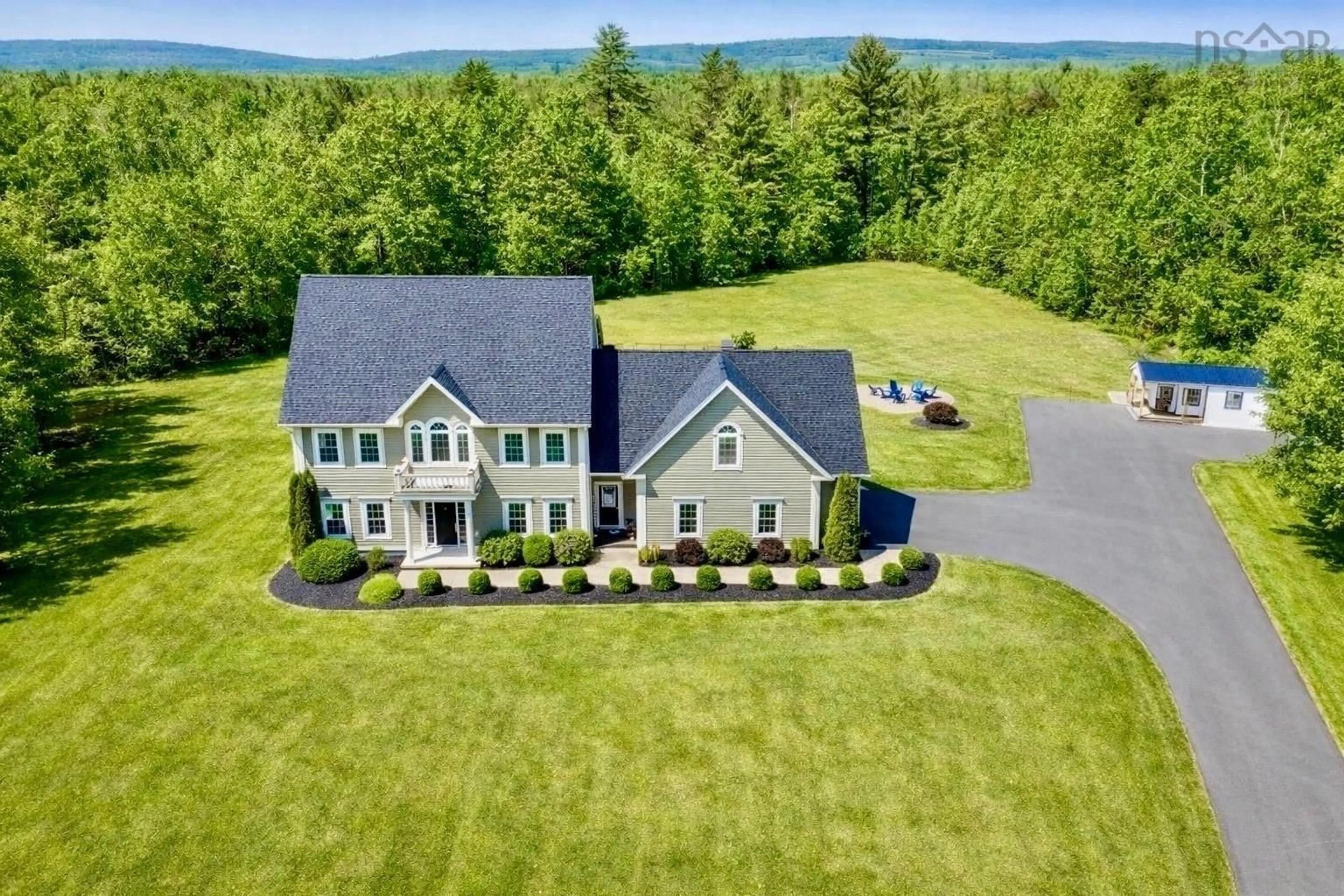 A pic from outside/outdoor area/front of a property/back of a property/a pic from drone, mountain view for 13697 Highway 1, Wilmot Nova Scotia B0P 1W0