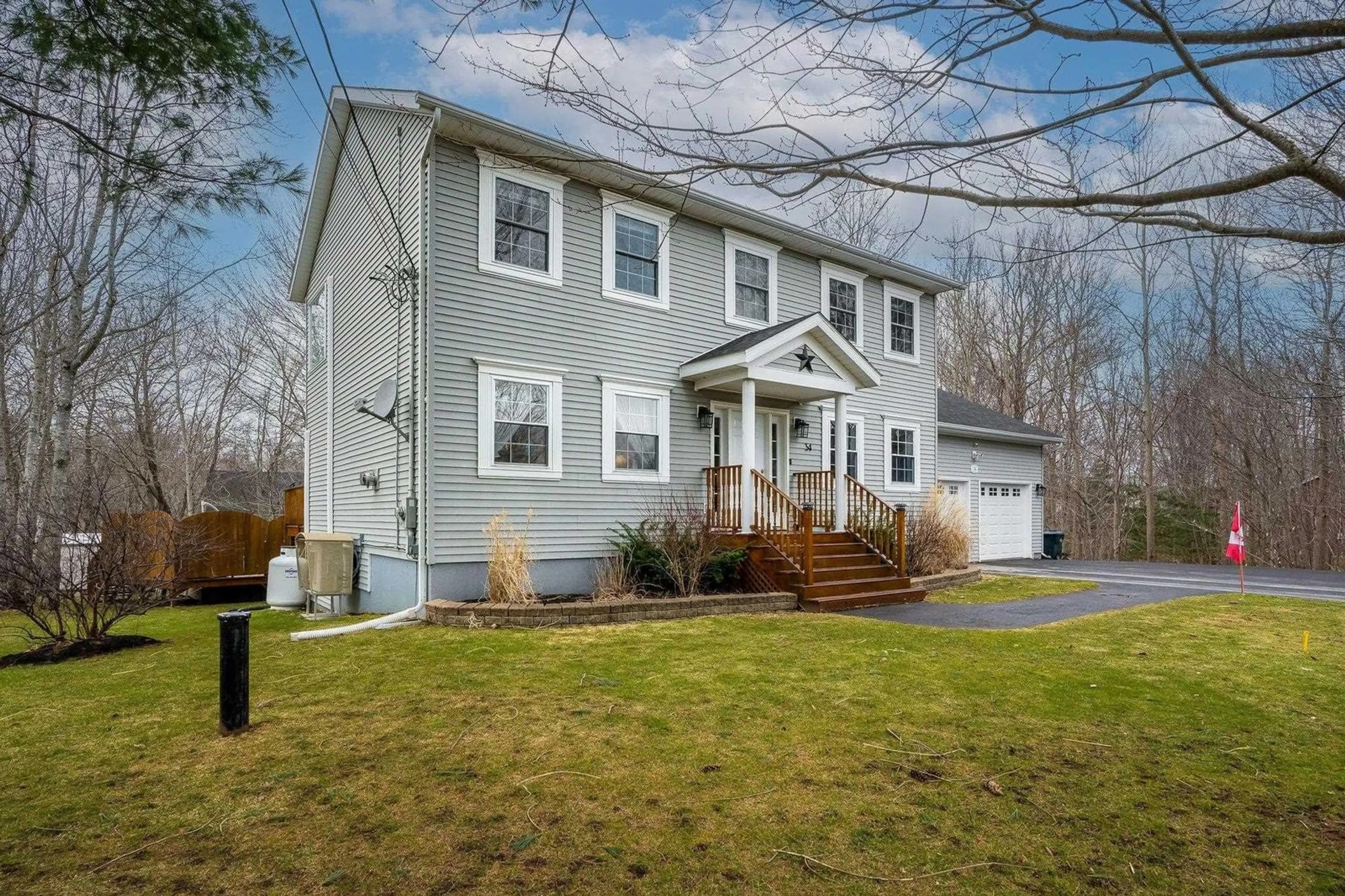 Home with vinyl exterior material, street for 34 Gravenstein Dr, Berwick Nova Scotia B0P 1E0
