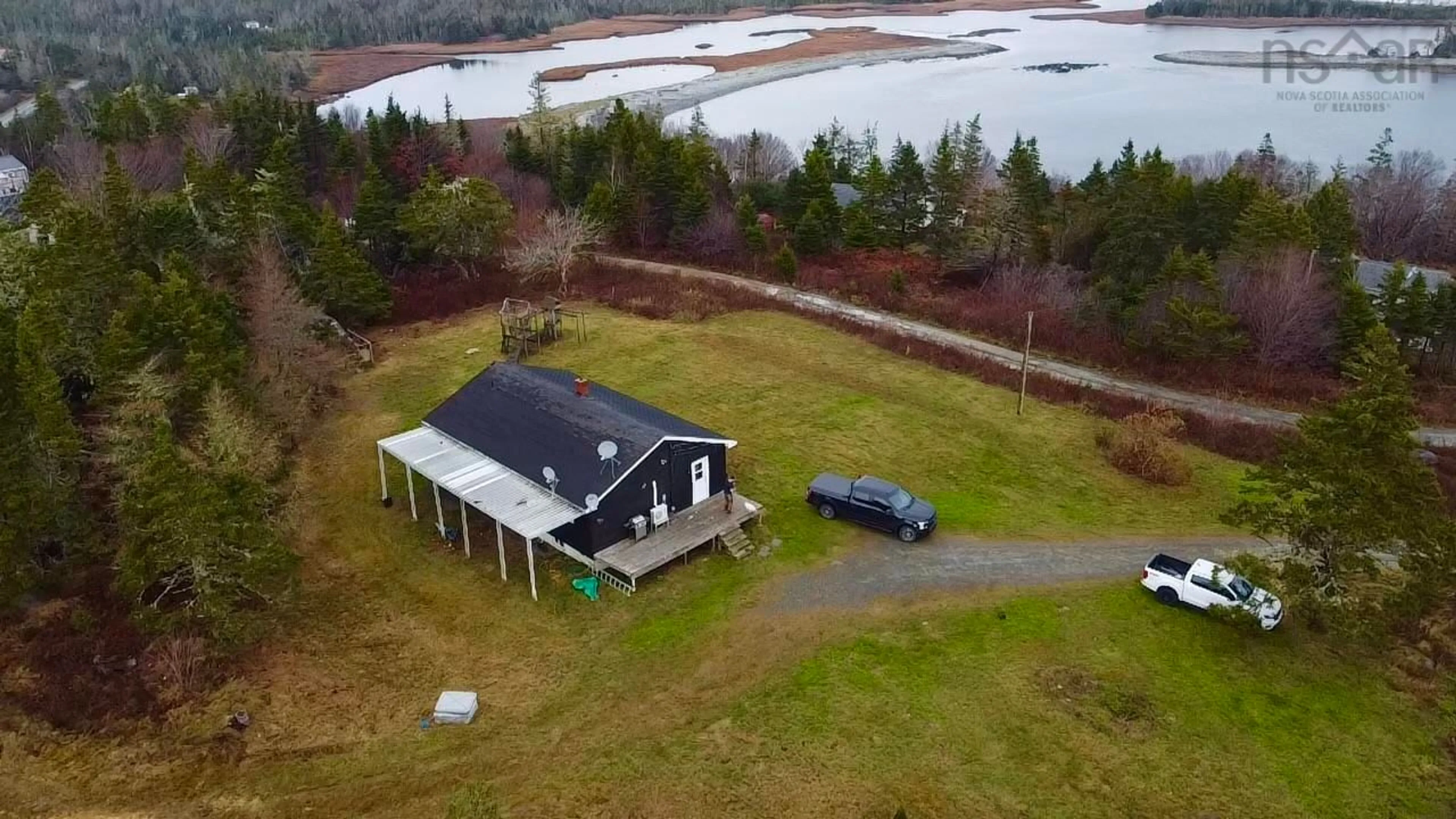 A pic from outside/outdoor area/front of a property/back of a property/a pic from drone, water/lake/river/ocean view for 2510 West Ship Harbour Crossroads, Owls Head Nova Scotia B0J 2L0