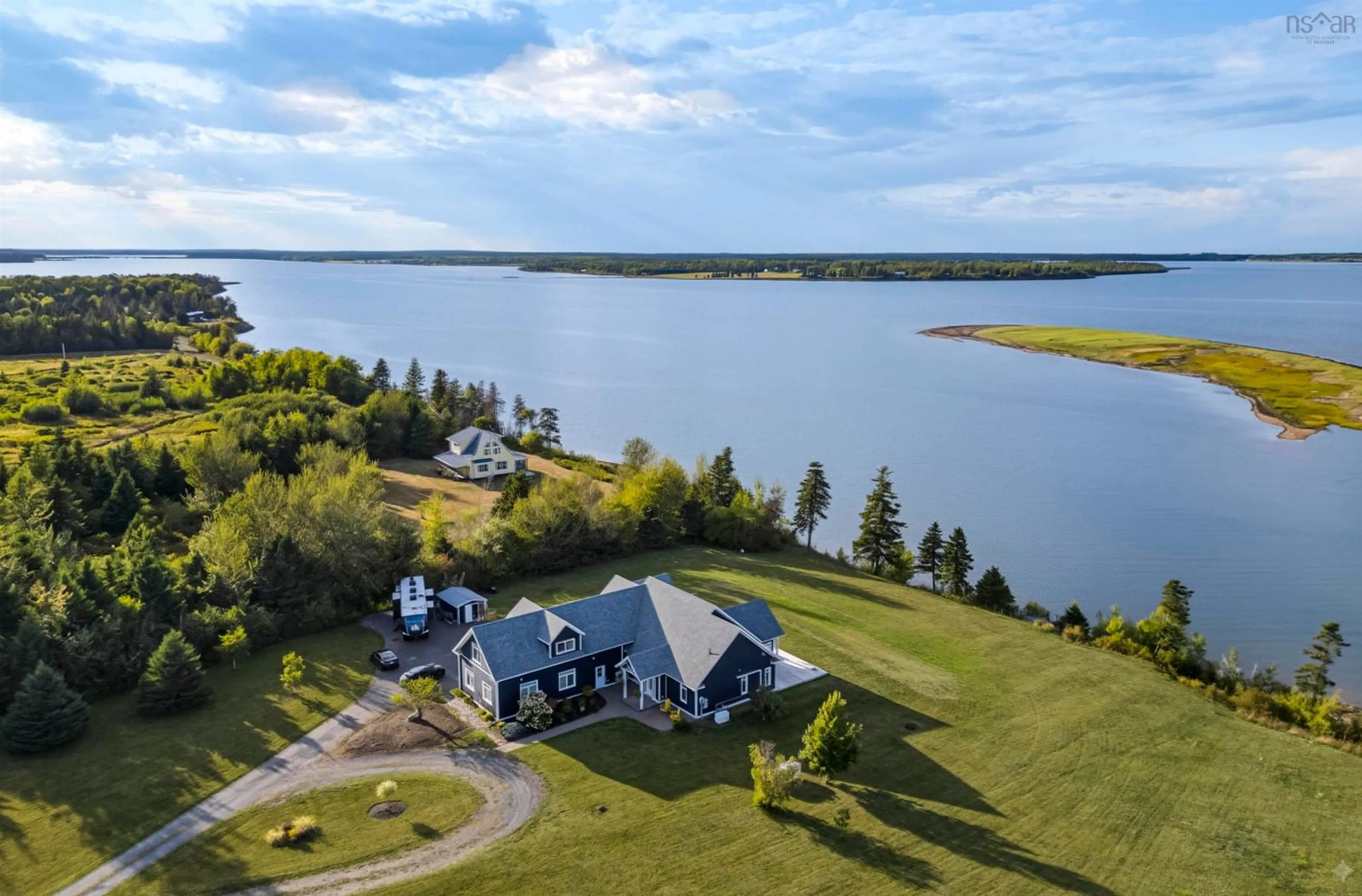 A pic from outside/outdoor area/front of a property/back of a property/a pic from drone, water/lake/river/ocean view for 76 Sandview Lane, Malagash Nova Scotia B0S 1E0