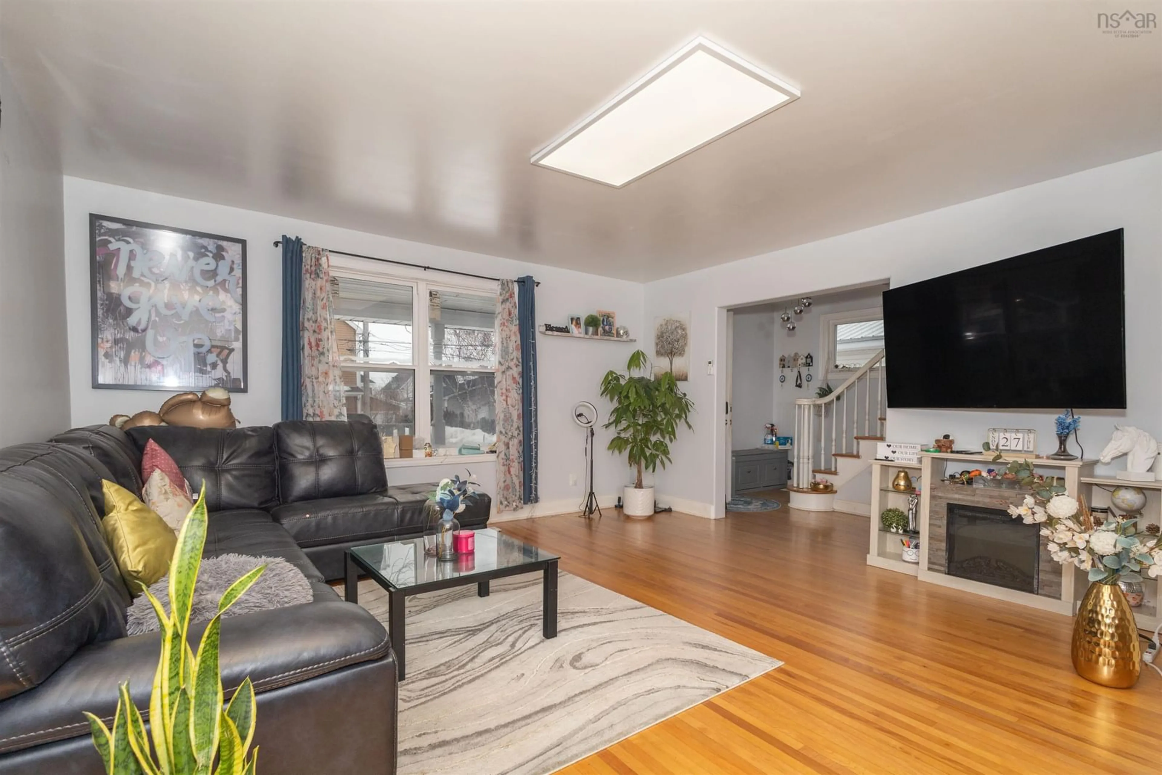 Living room with furniture, unknown for 31 Stornaway St, Ashby Nova Scotia B1P 2P7