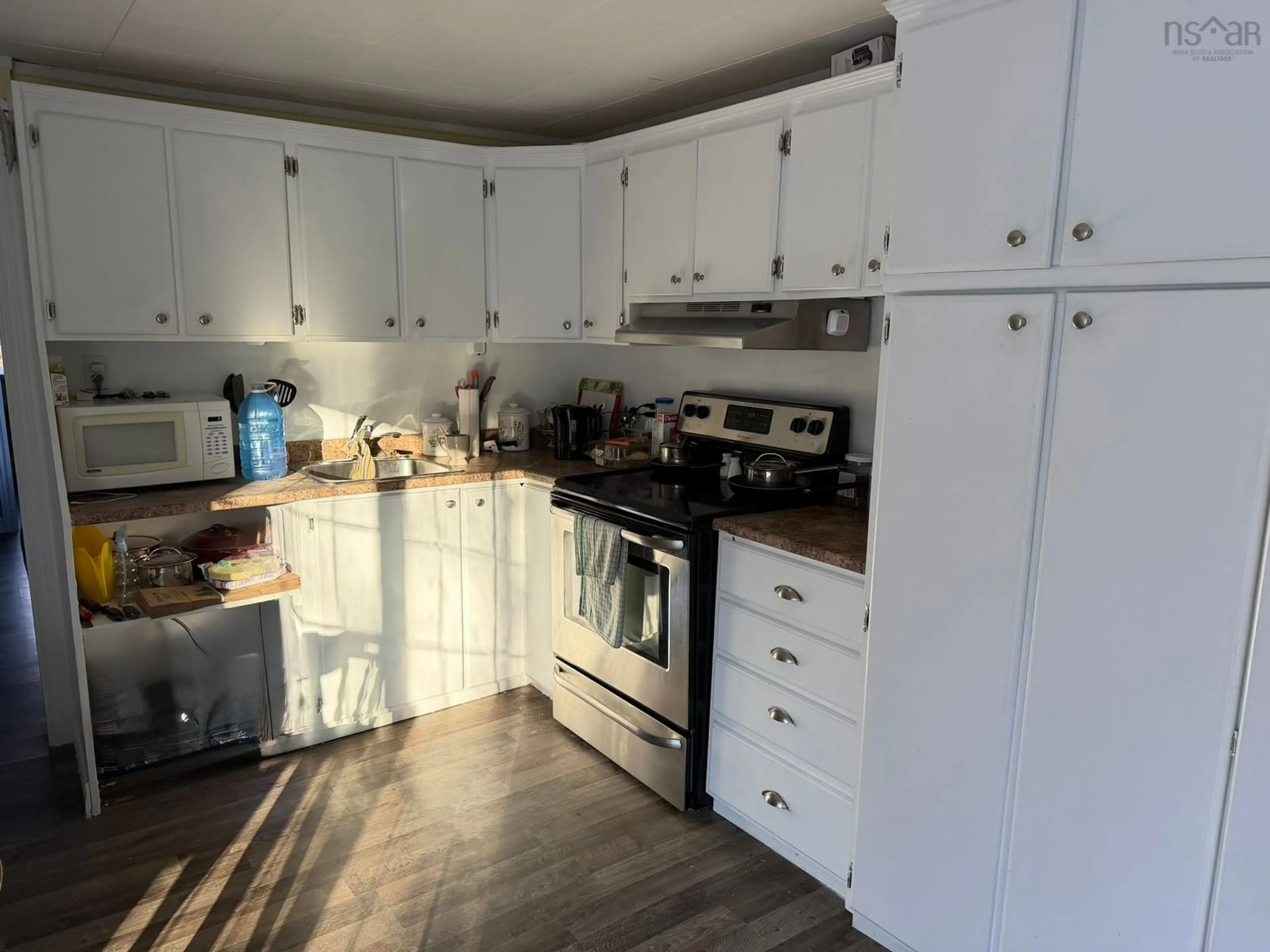 Standard kitchen, wood/laminate floor for 5538 Highway 3, White Point Nova Scotia B0T 1K0