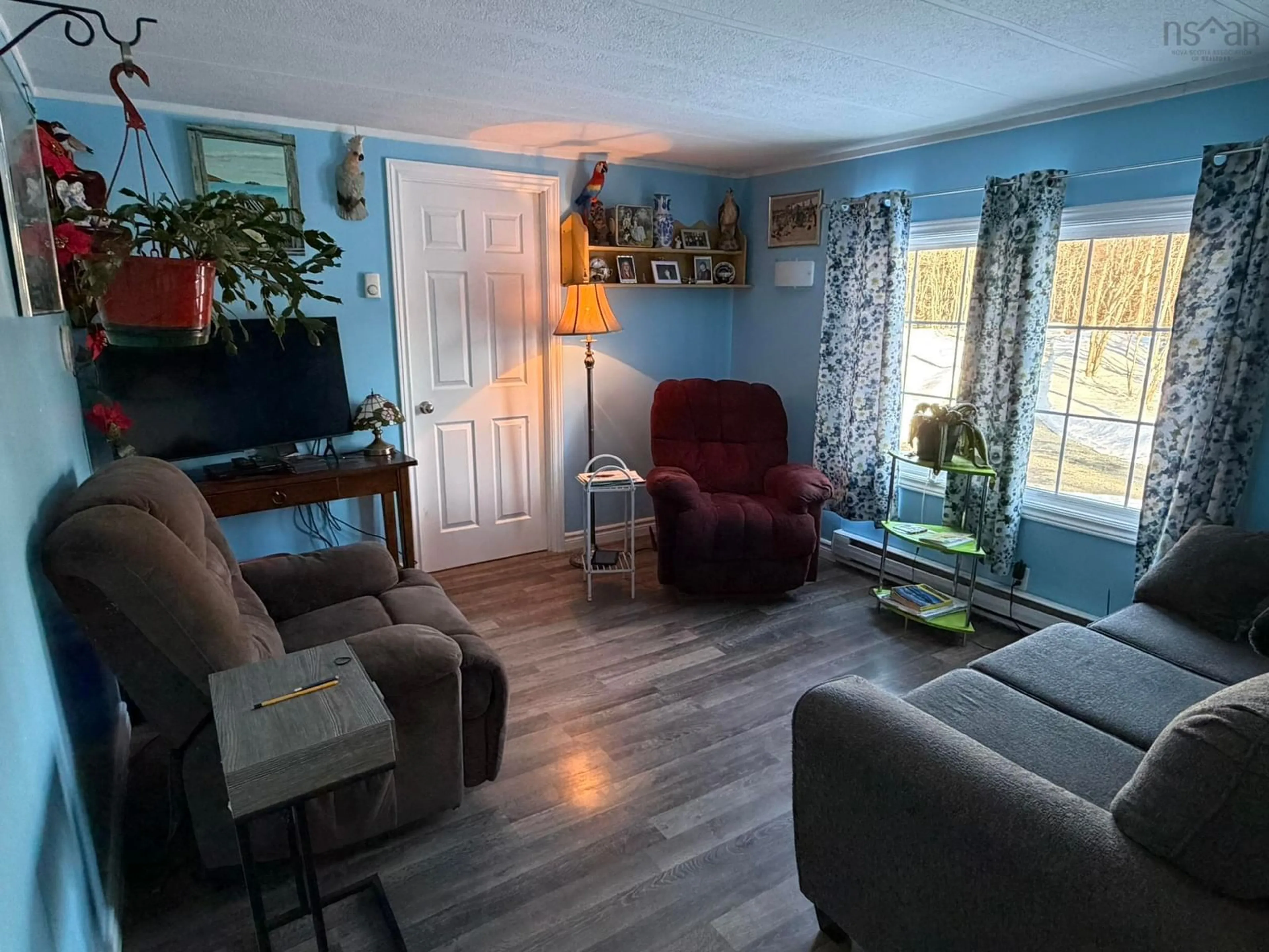 Living room with furniture, unknown for 5538 Highway 3, White Point Nova Scotia B0T 1K0
