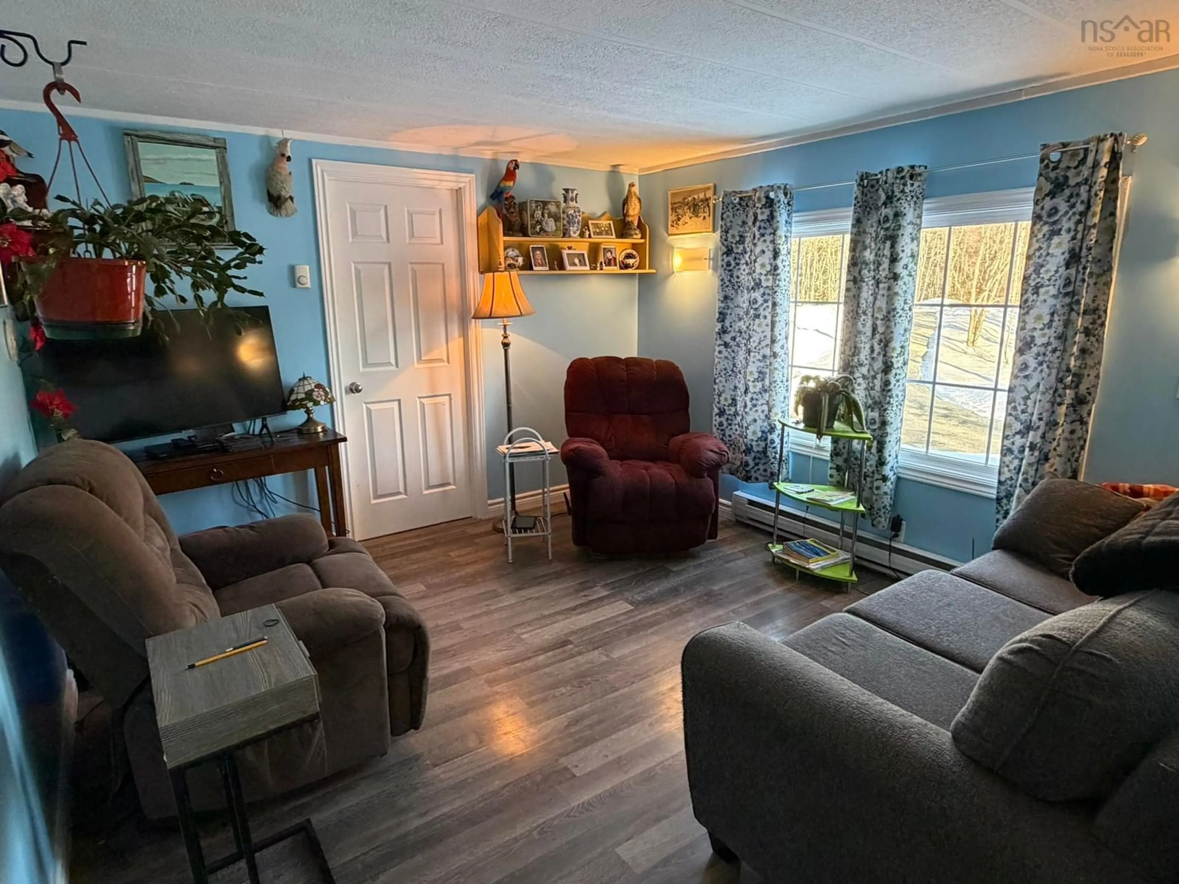 Living room with furniture, unknown for 5538 Highway 3, White Point Nova Scotia B0T 1K0