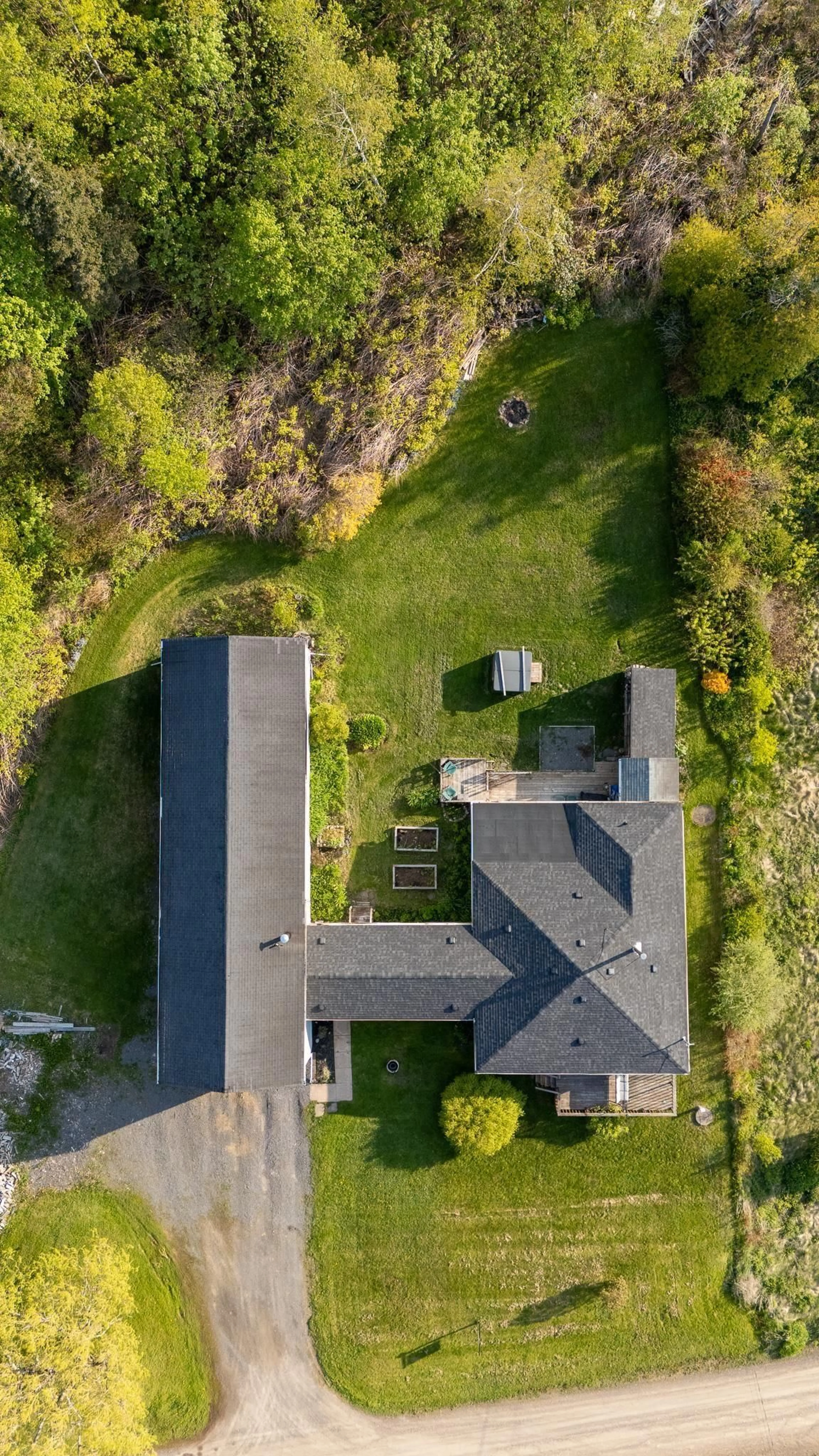 A pic from outside/outdoor area/front of a property/back of a property/a pic from drone, street for 60 Cove Rd, Halls Harbour Nova Scotia B0P 1J0