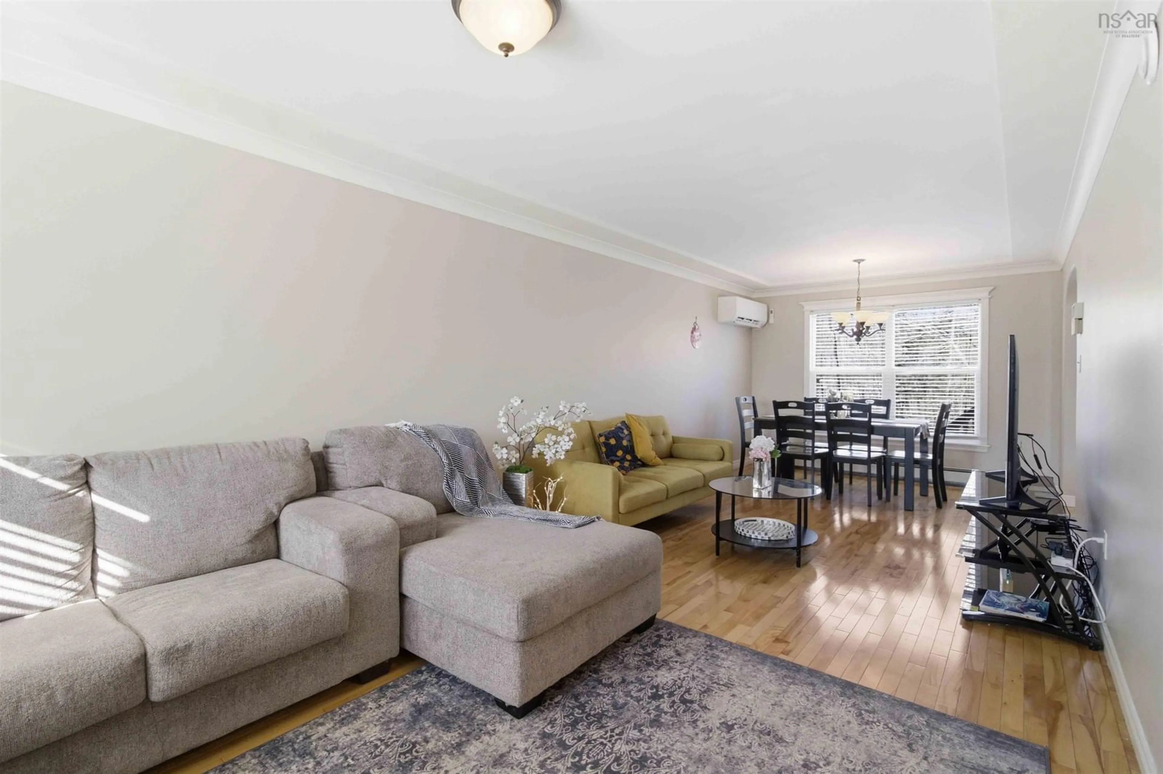 Living room with furniture, wood/laminate floor for 32 Redden Crt, Bedford Nova Scotia B4A 4G5