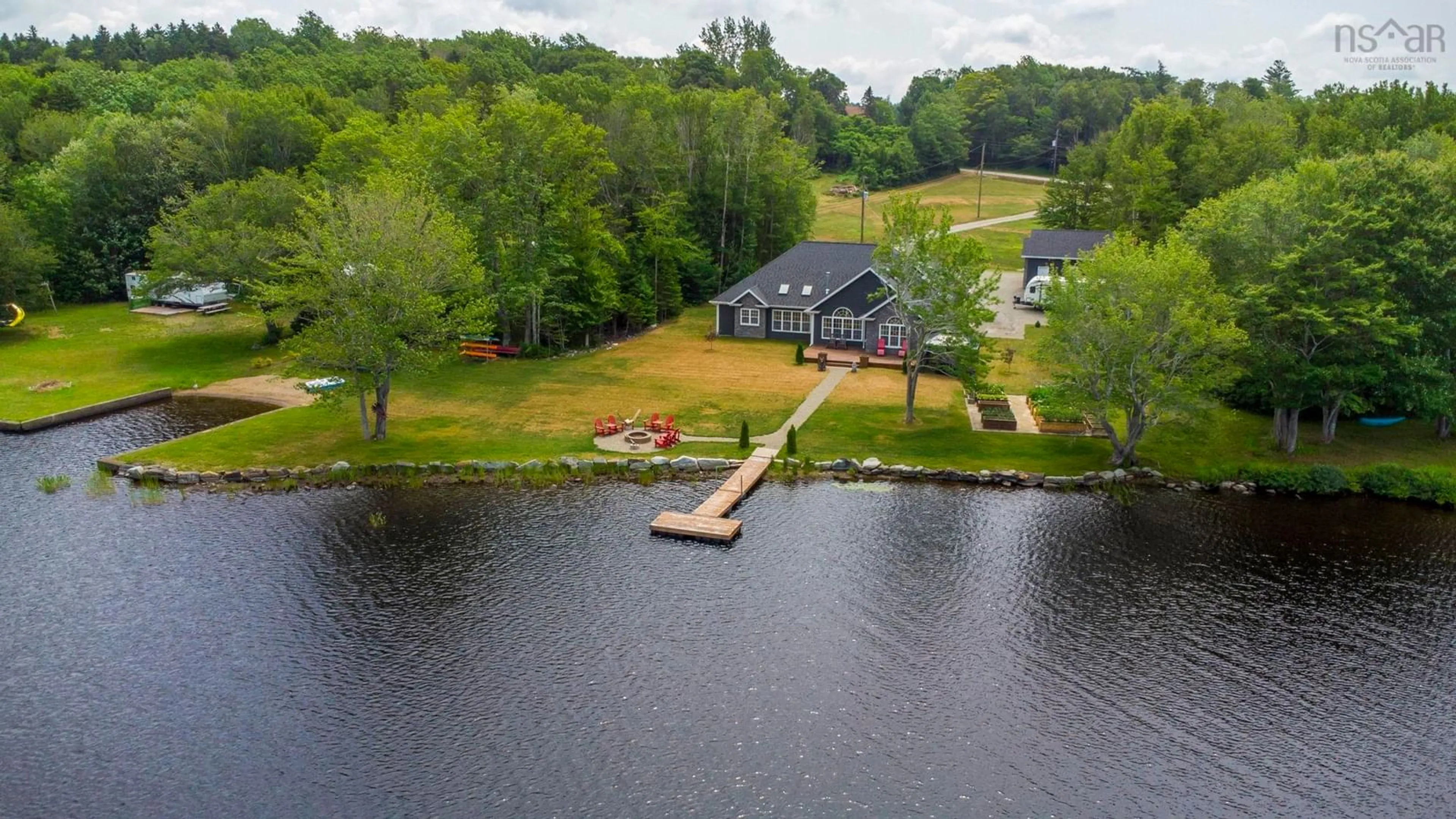 A pic from outside/outdoor area/front of a property/back of a property/a pic from drone, water/lake/river/ocean view for 405 Townshiplineroad, Ohio Nova Scotia B0W 3T0