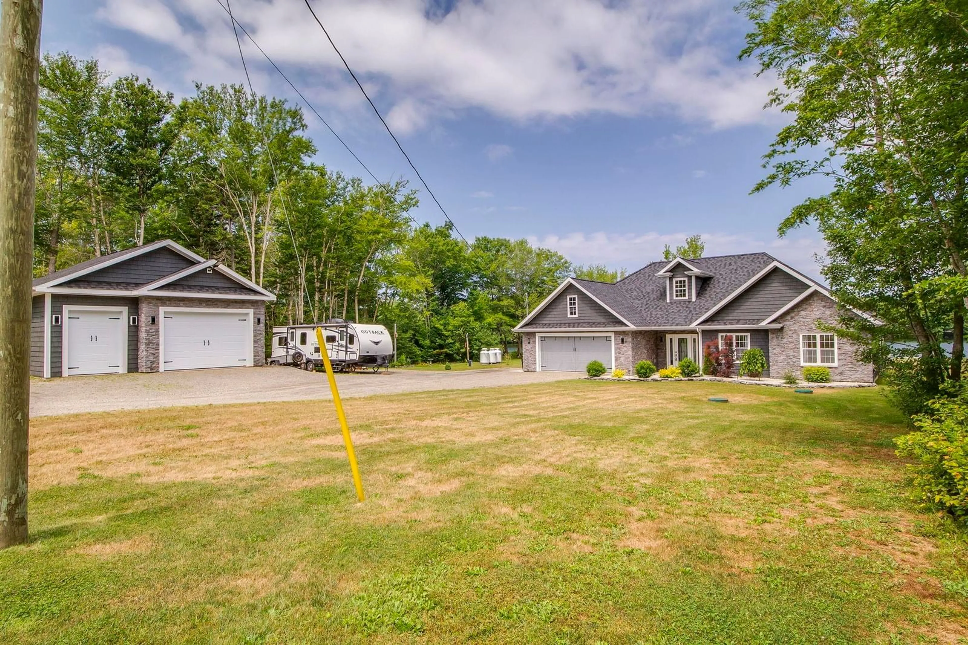 A pic from outside/outdoor area/front of a property/back of a property/a pic from drone, street for 405 Townshiplineroad, Ohio Nova Scotia B0W 3T0