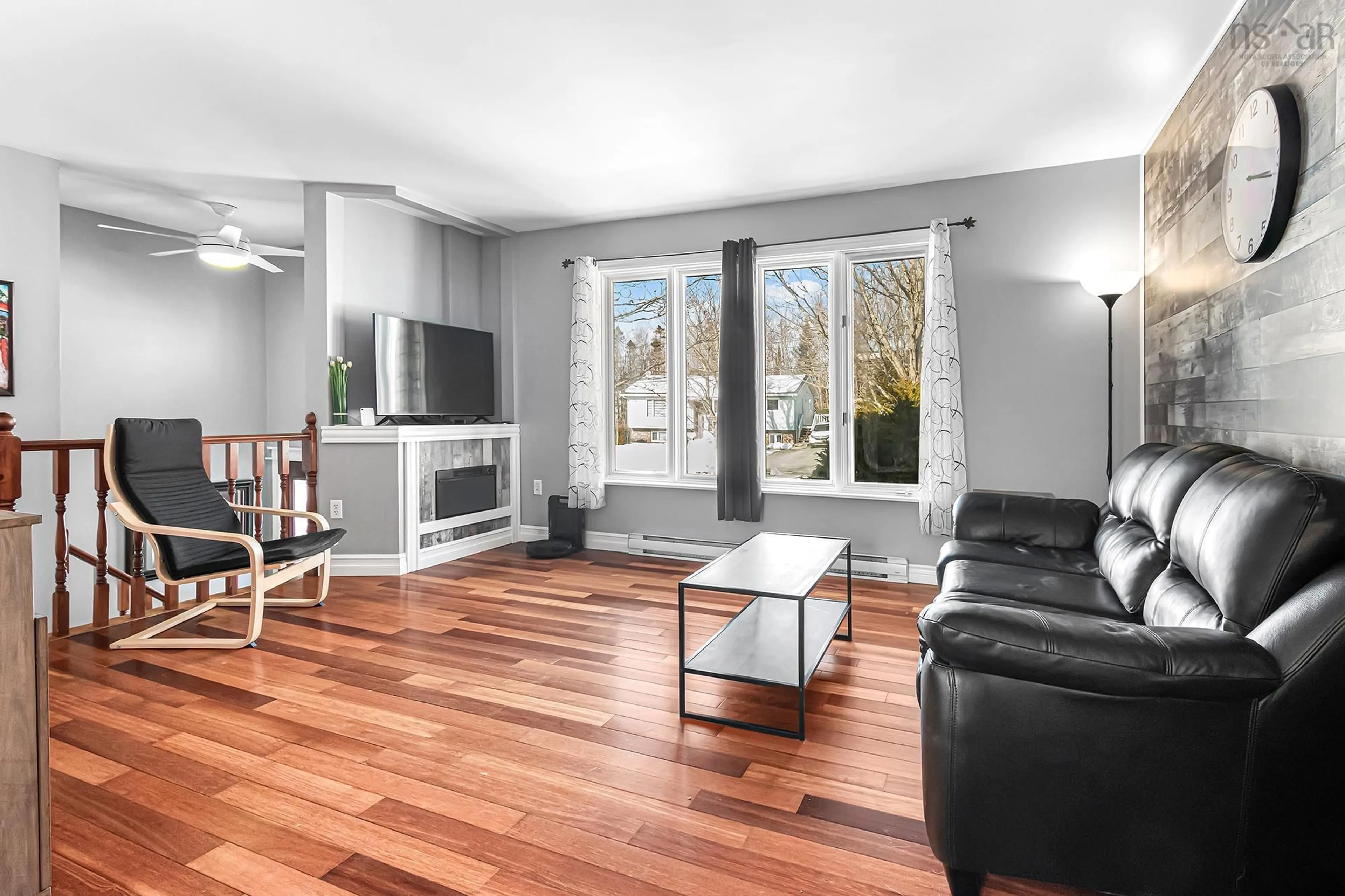 Living room with furniture, wood/laminate floor for 35 Poplar Dr, Lantz Nova Scotia B2S 1X1
