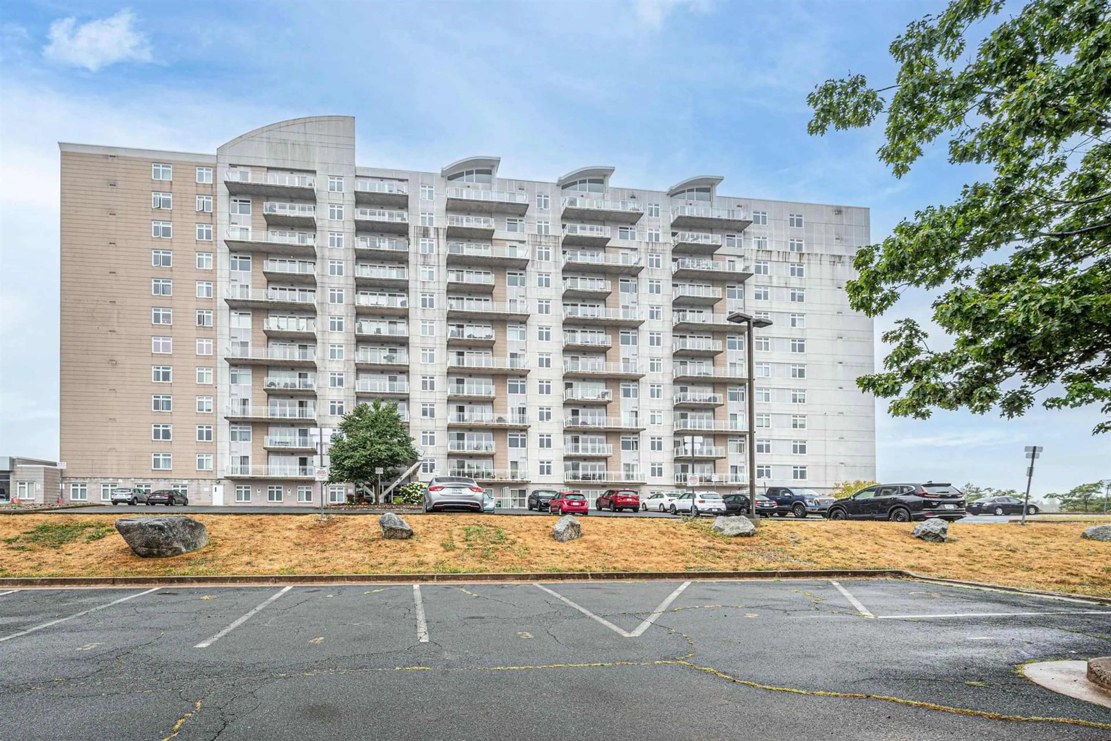 A pic from outside/outdoor area/front of a property/back of a property/a pic from drone, building for 60 Walter Havill Dr #703, Halifax Nova Scotia B3N 0A9