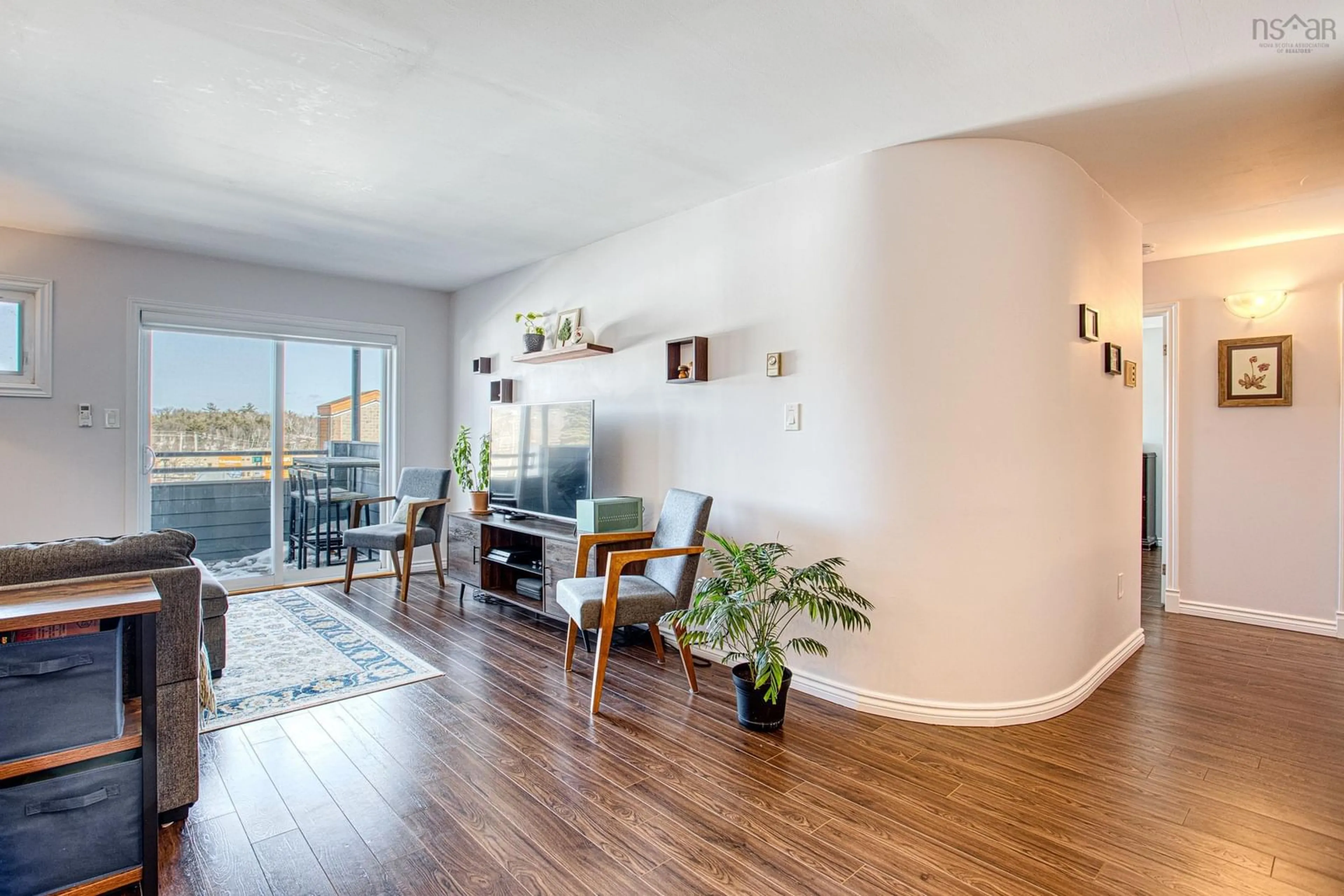 Living room with furniture, wood/laminate floor for 24 Hammonds Plains Rd #221, Halifax Nova Scotia B4A 3P3