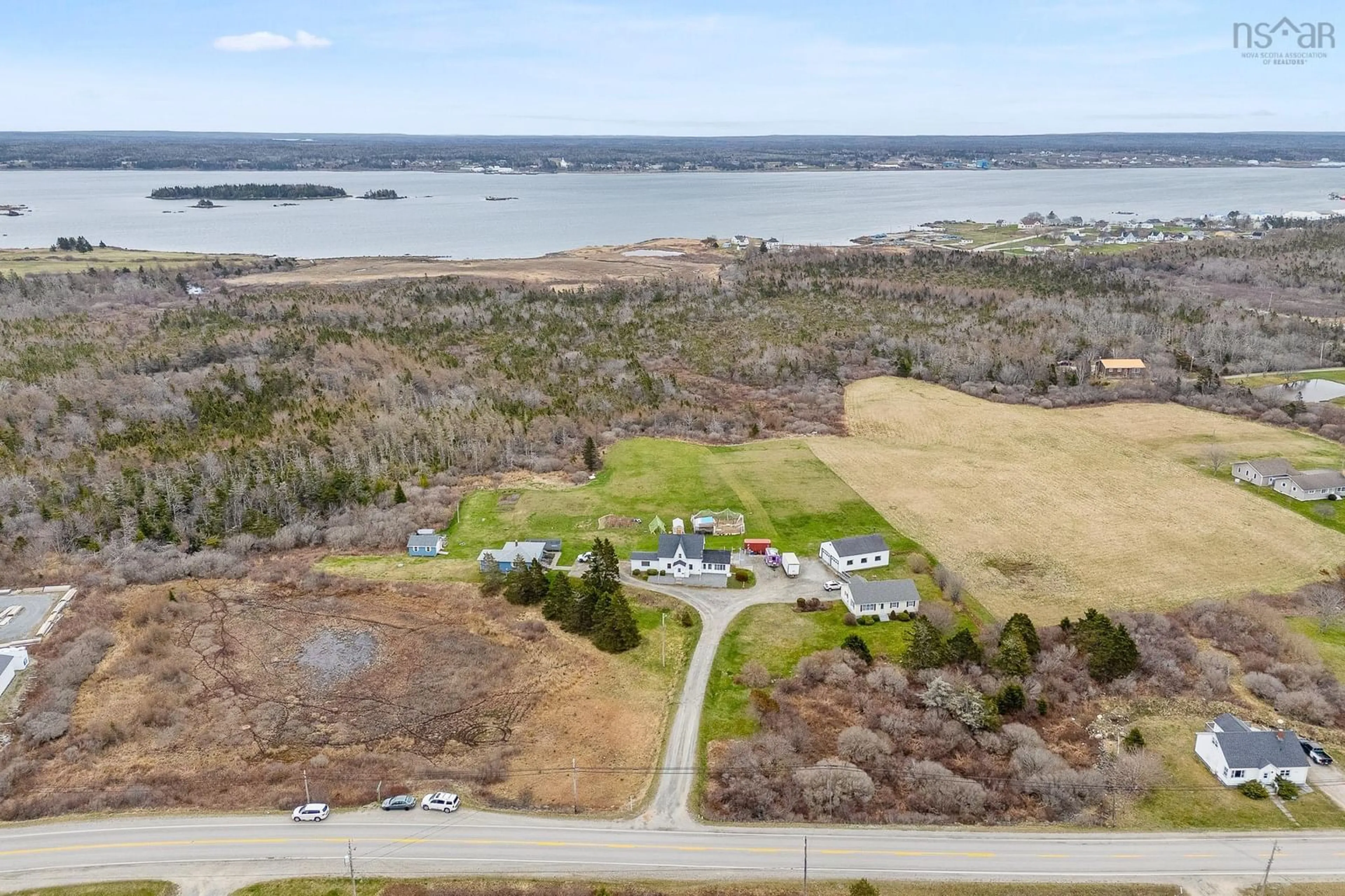 A pic from outside/outdoor area/front of a property/back of a property/a pic from drone, water/lake/river/ocean view for 17 Ponderosa Lane, Lower West Pubnico Nova Scotia B0W 2M0