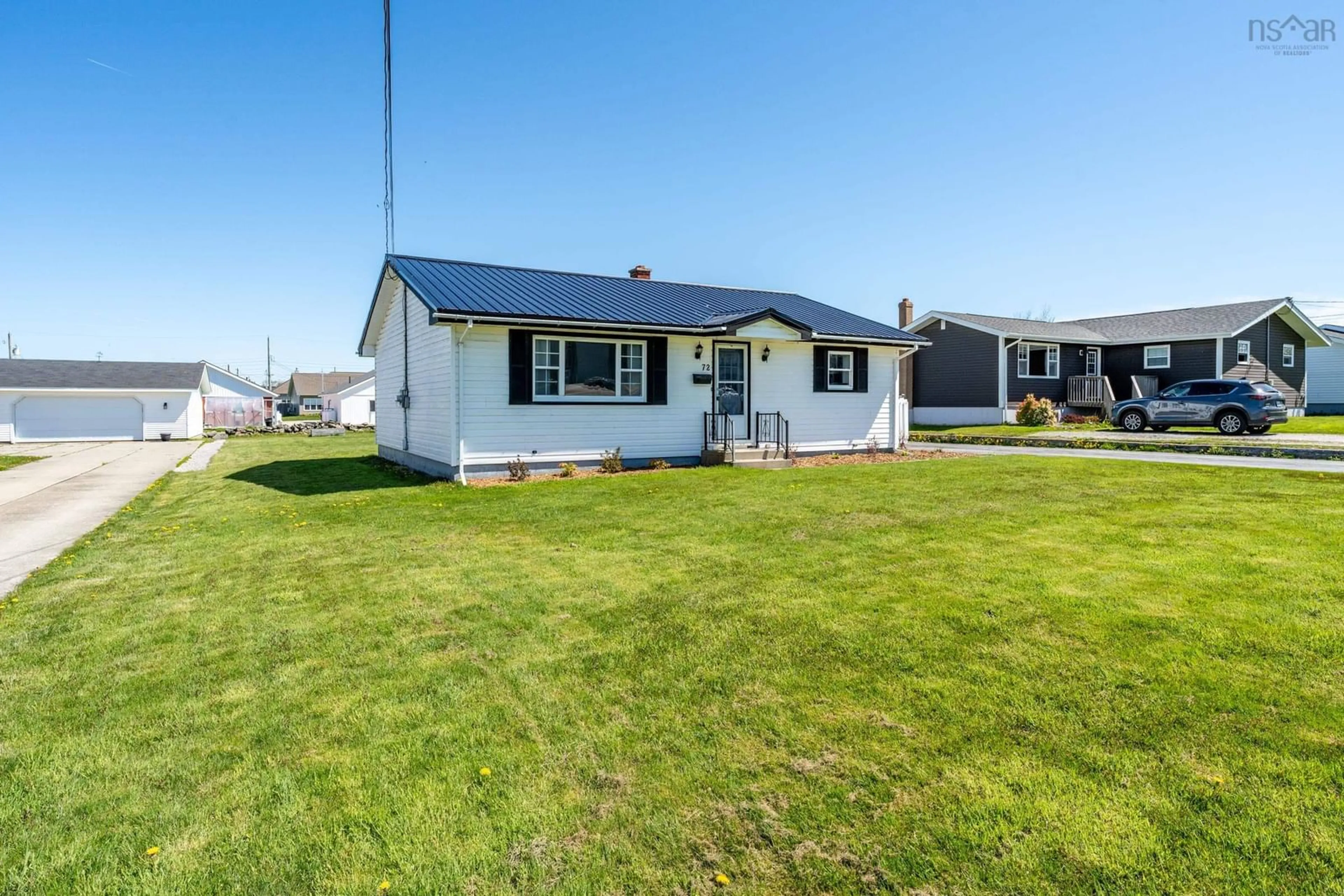 Home with vinyl exterior material, street for 72 Hibernia St, Yarmouth Nova Scotia B5A 2M6