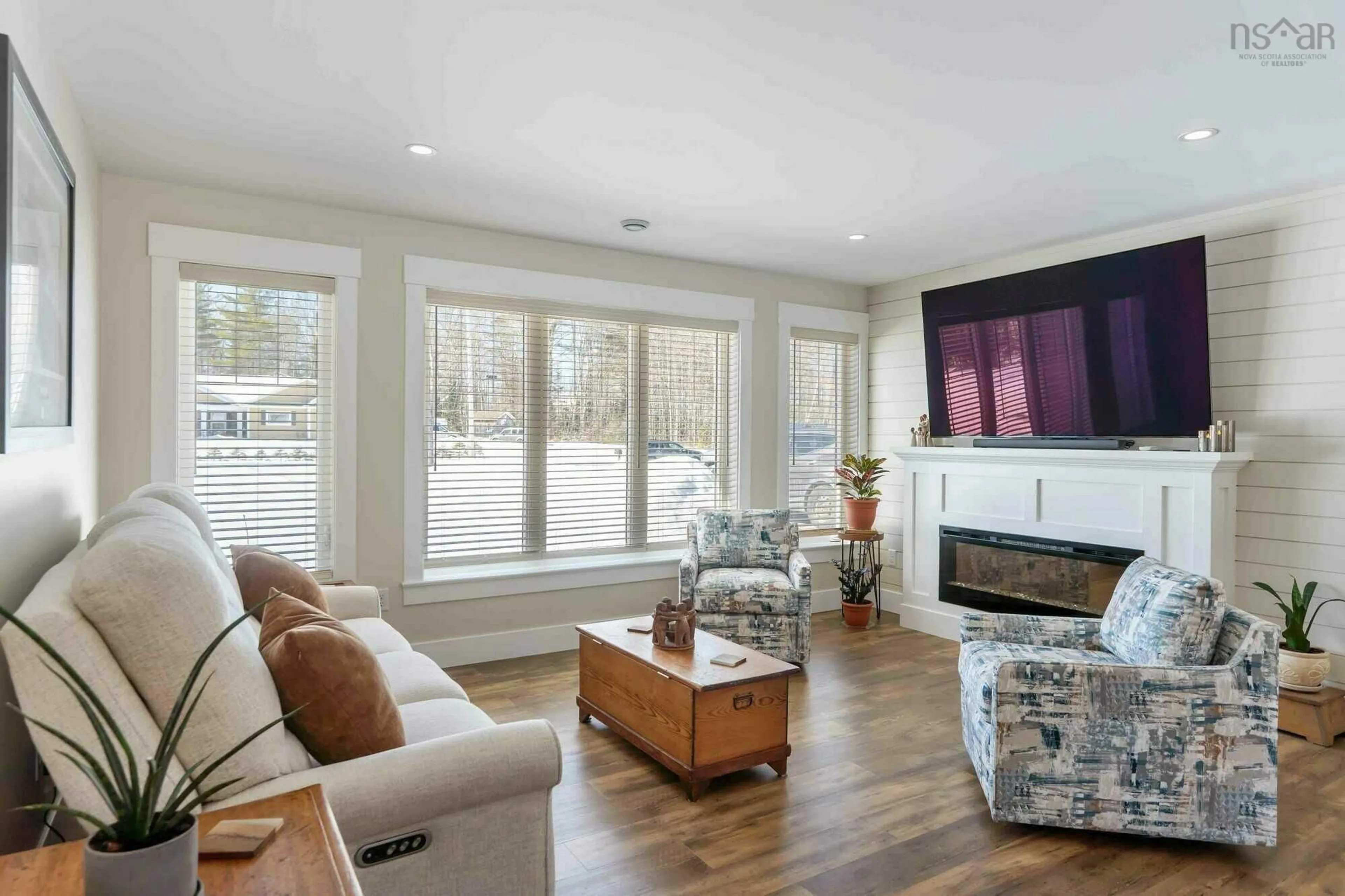 Living room with furniture, wood/laminate floor for 472 Alexander Mackenzie Rd, Farmington Nova Scotia B0P 1W0