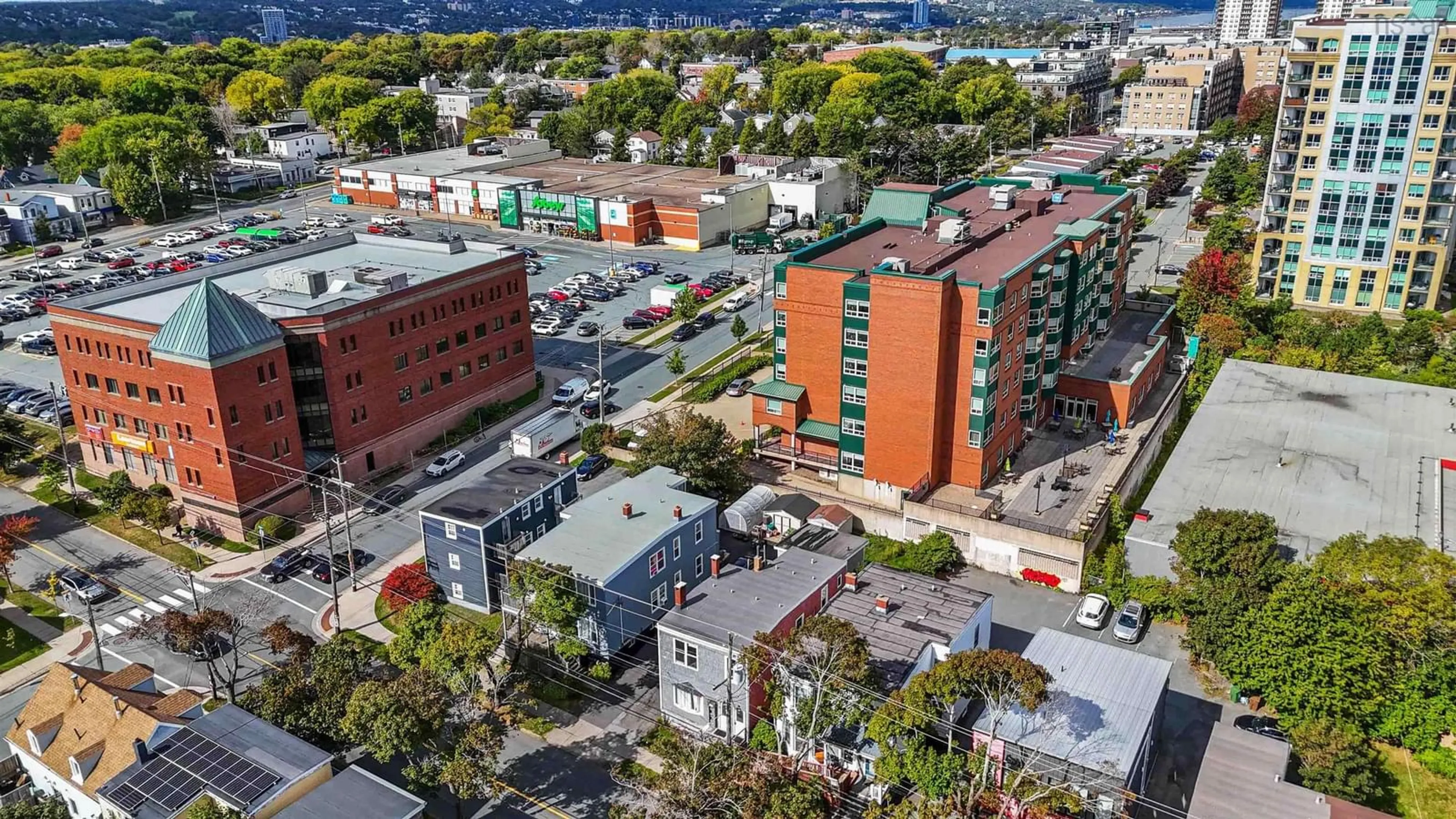 A pic from outside/outdoor area/front of a property/back of a property/a pic from drone, city buildings view from balcony for 6135 North St, Halifax Nova Scotia B3K 1P2