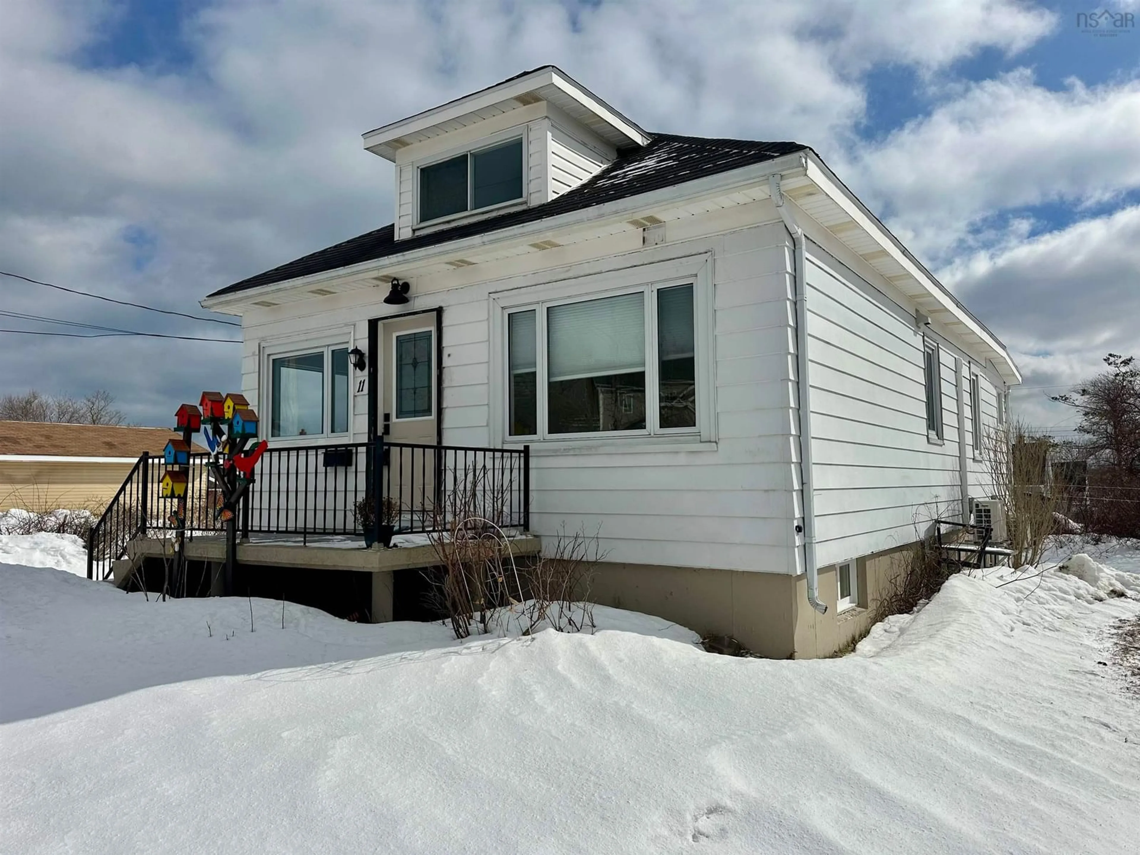 Home with vinyl exterior material, street for 11 James St, Glace Bay Nova Scotia B1A 2Y1