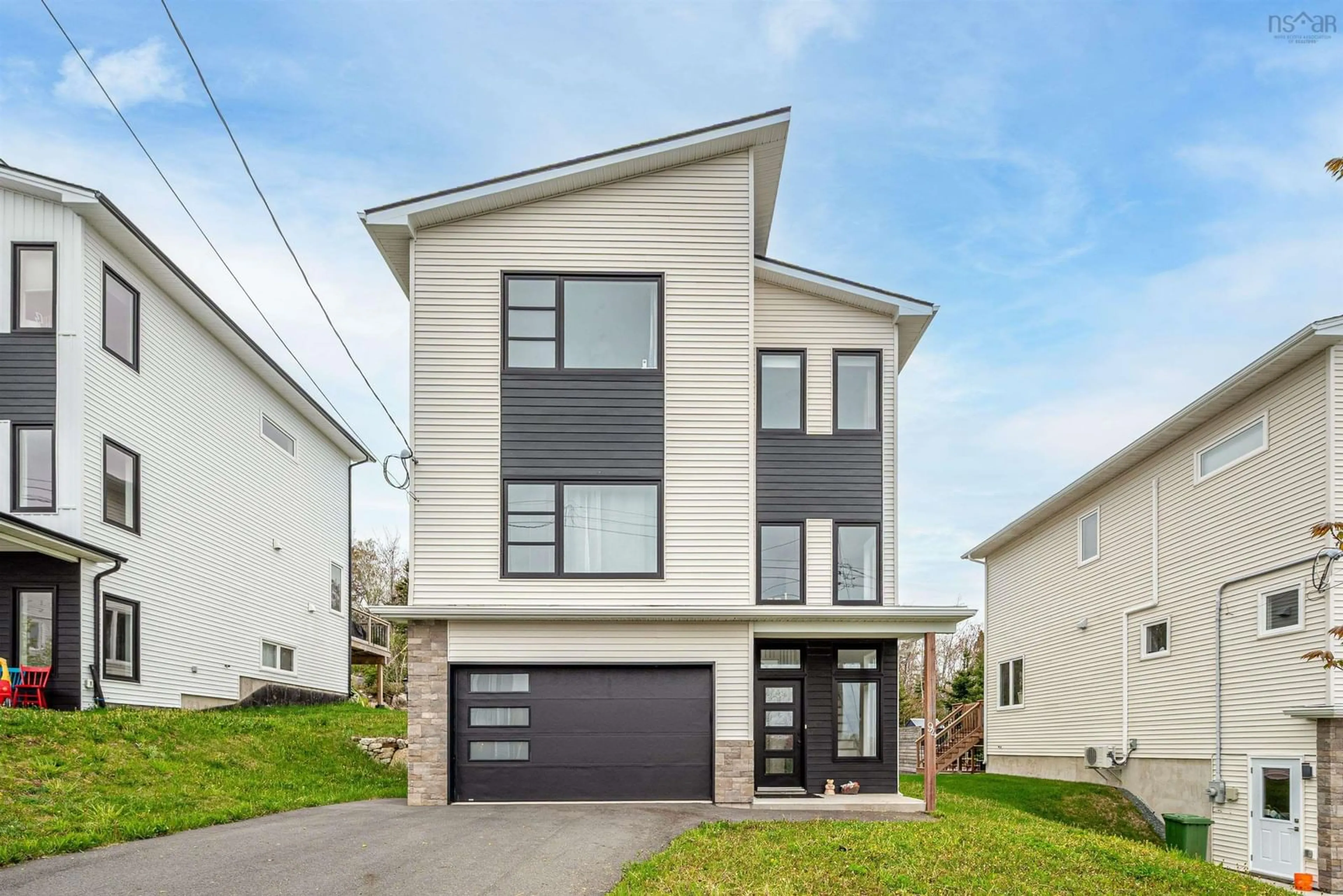 Home with vinyl exterior material, street for 94 Angler Dr, Herring Cove Nova Scotia B3R 0C8