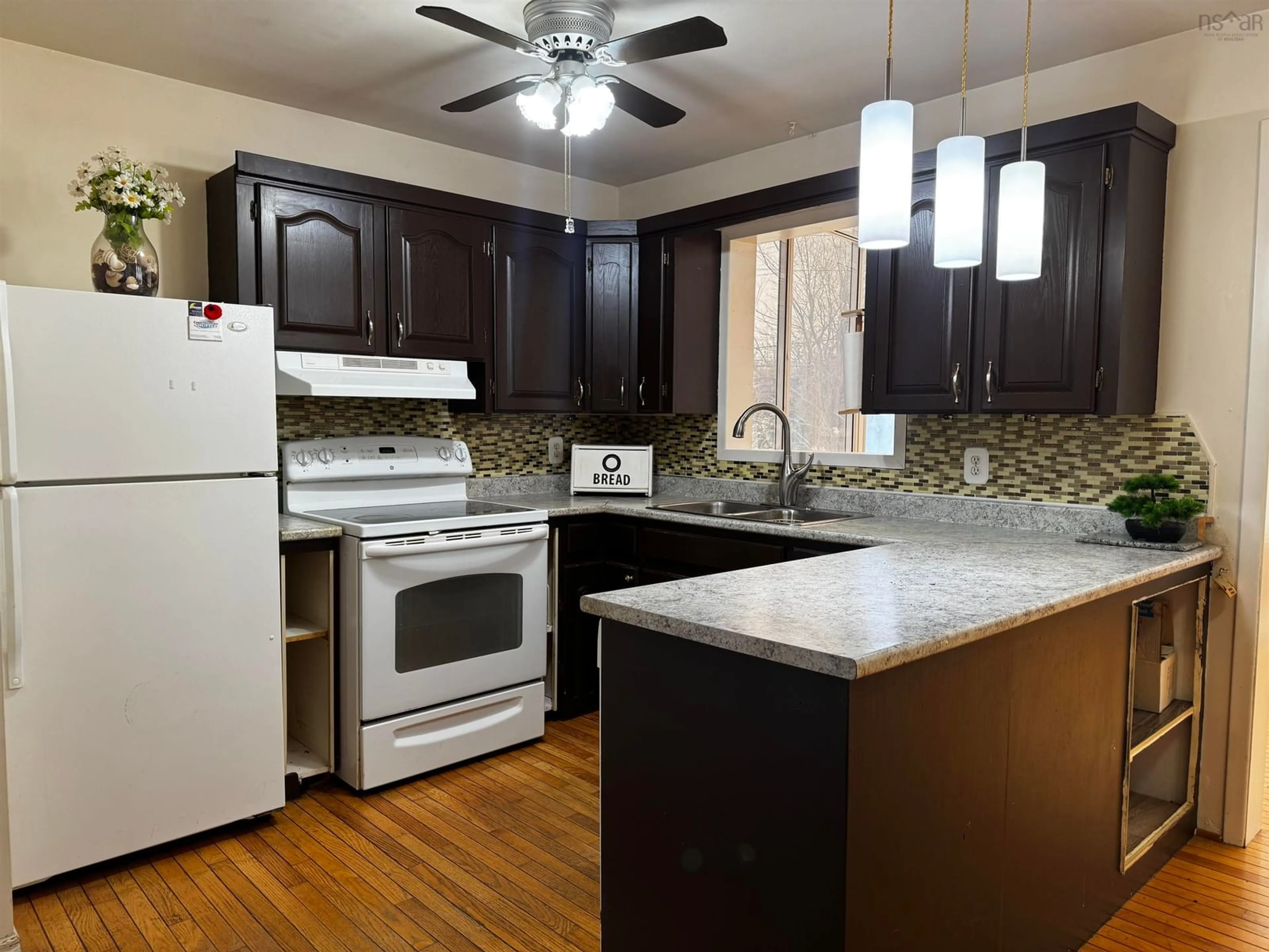 Standard kitchen, wood/laminate floor for 6221 Seaside Dr, Gardiner Mines Nova Scotia B1H 5K4