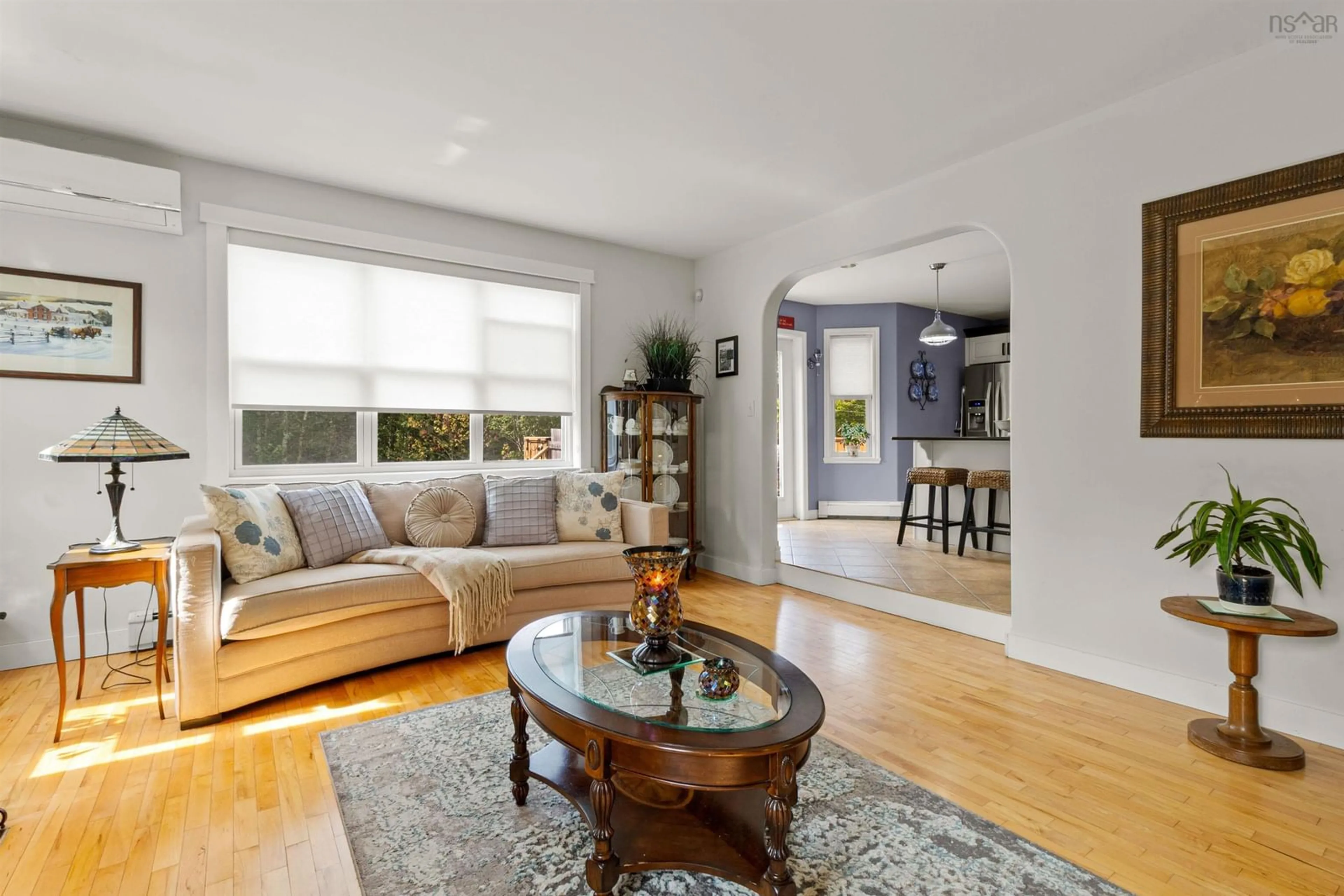 Living room with furniture, wood/laminate floor for 122 Honeysuckle Rd, Middle Sackville Nova Scotia B4E 3J9