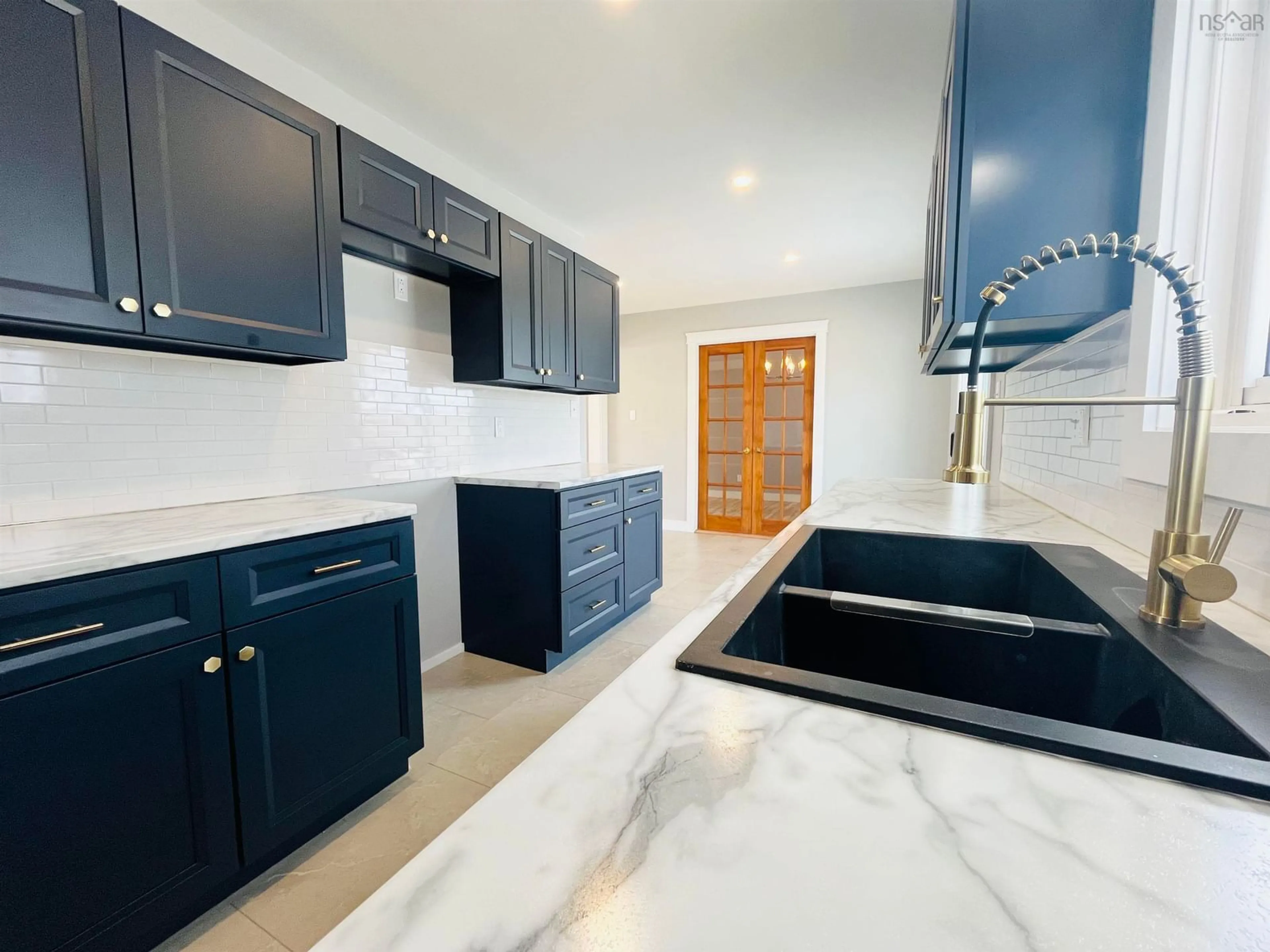 Open concept kitchen, ceramic/tile floor for 39 Rogers Ave, Amherst Nova Scotia B4H 2J7