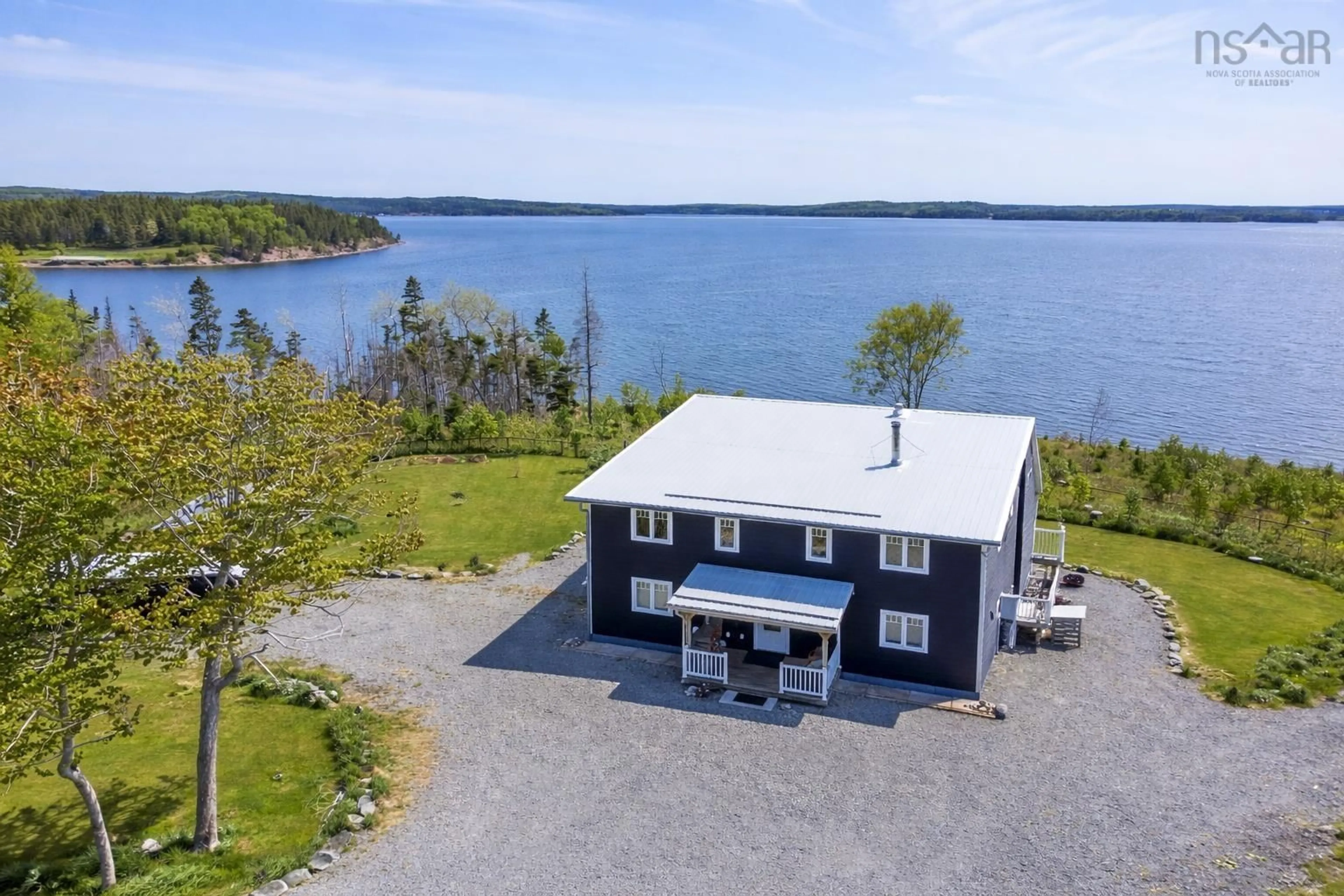 A pic from outside/outdoor area/front of a property/back of a property/a pic from drone, water/lake/river/ocean view for 122 Peter Sosna Dr, Macnabs Cove Nova Scotia B0E 3B0
