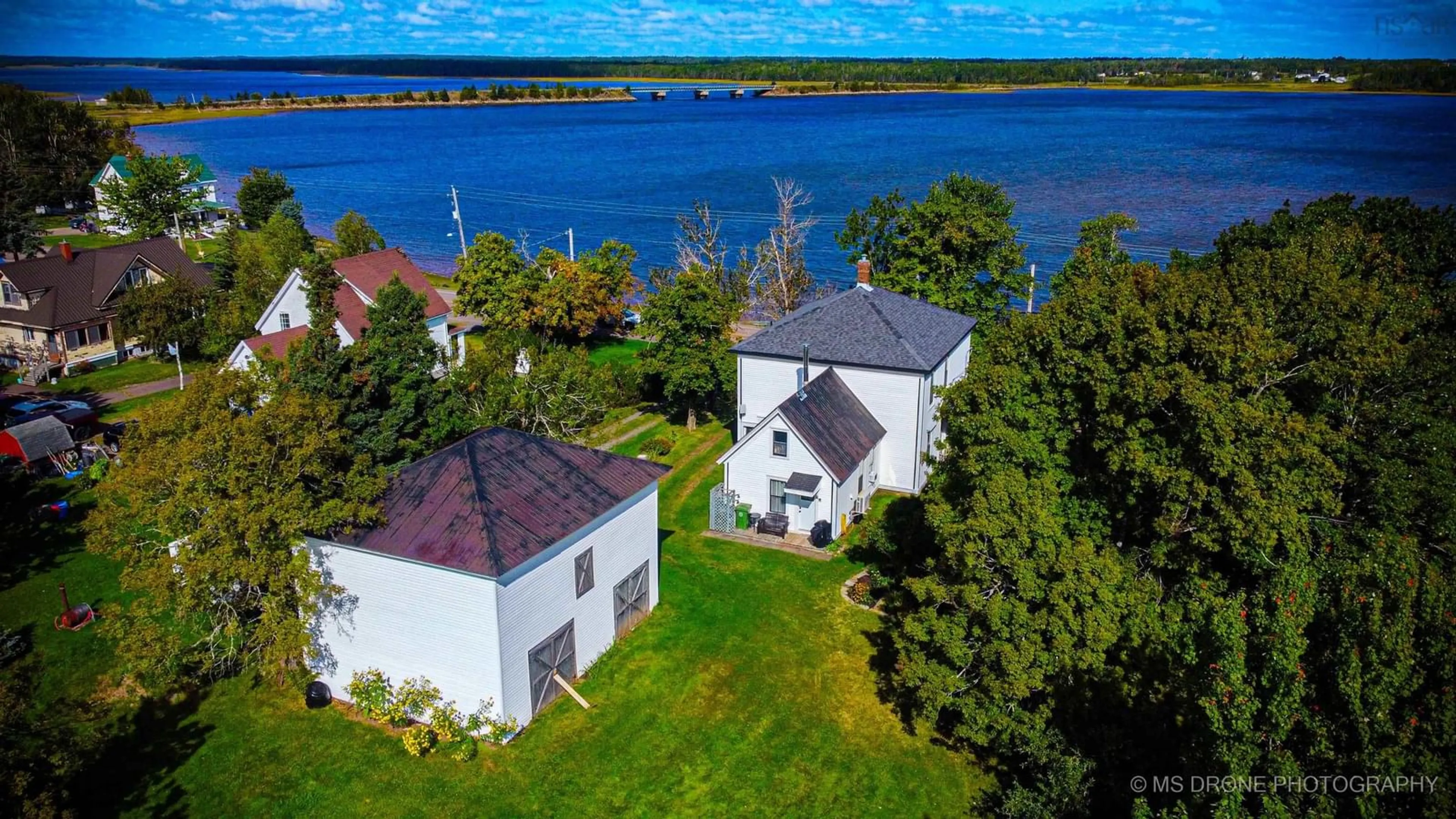 A pic from outside/outdoor area/front of a property/back of a property/a pic from drone, water/lake/river/ocean view for 13836 Highway #6, Wallace Nova Scotia B0K 1Y0