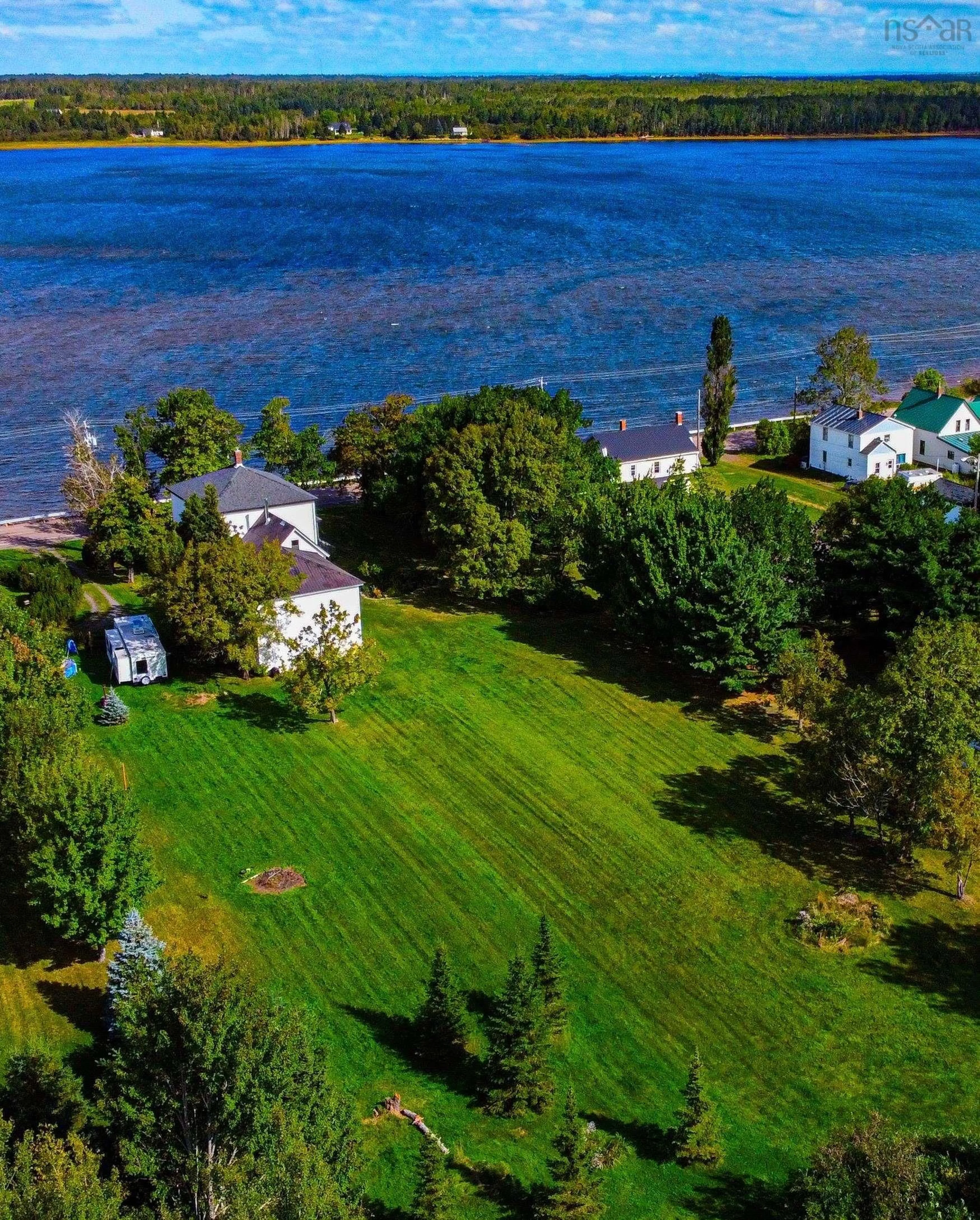 A pic from outside/outdoor area/front of a property/back of a property/a pic from drone, water/lake/river/ocean view for 13836 Highway #6, Wallace Nova Scotia B0K 1Y0
