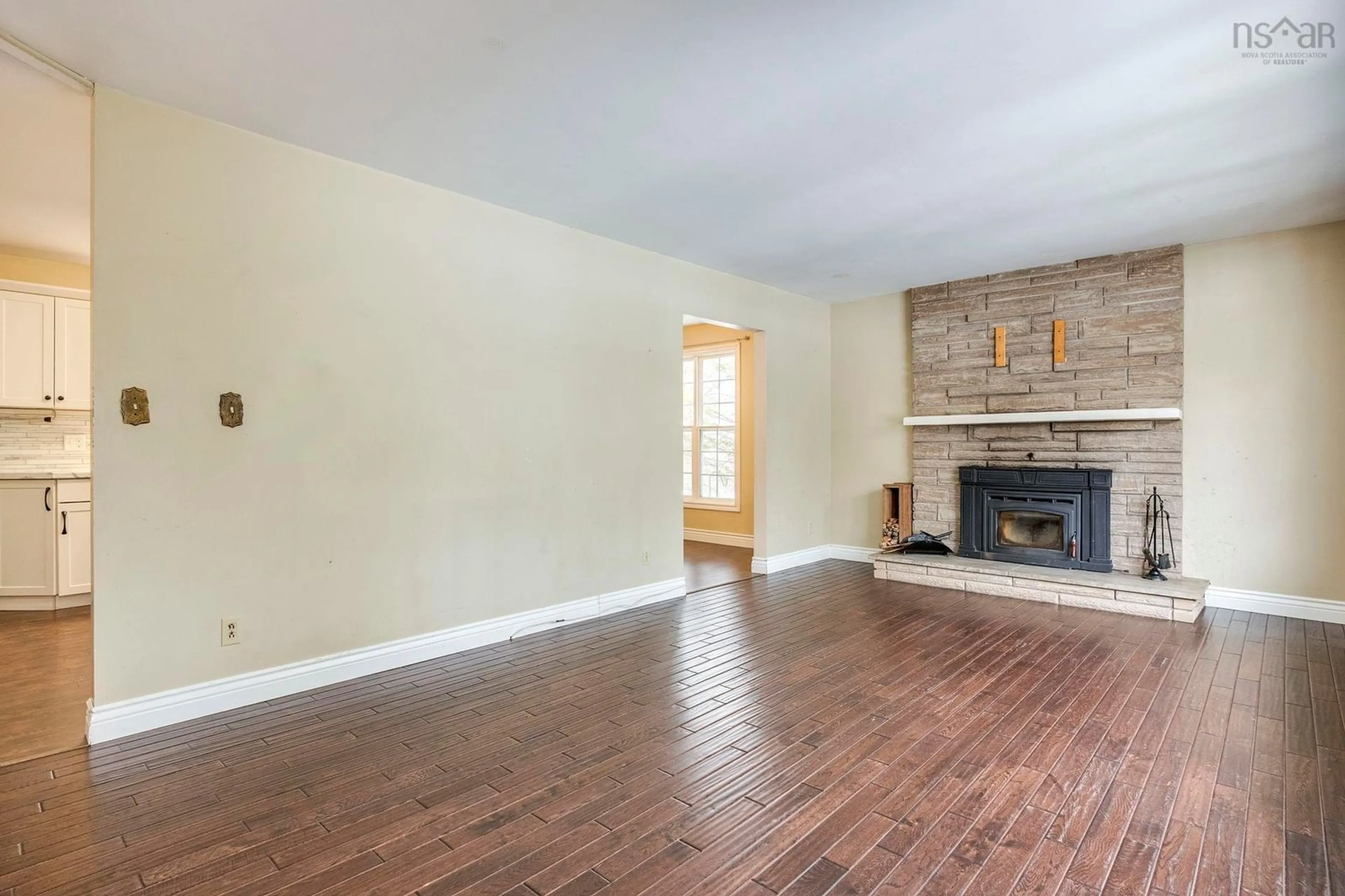 Living room with furniture, wood/laminate floor for 18 Cook Ave, Wilmot Nova Scotia B0P 1W0