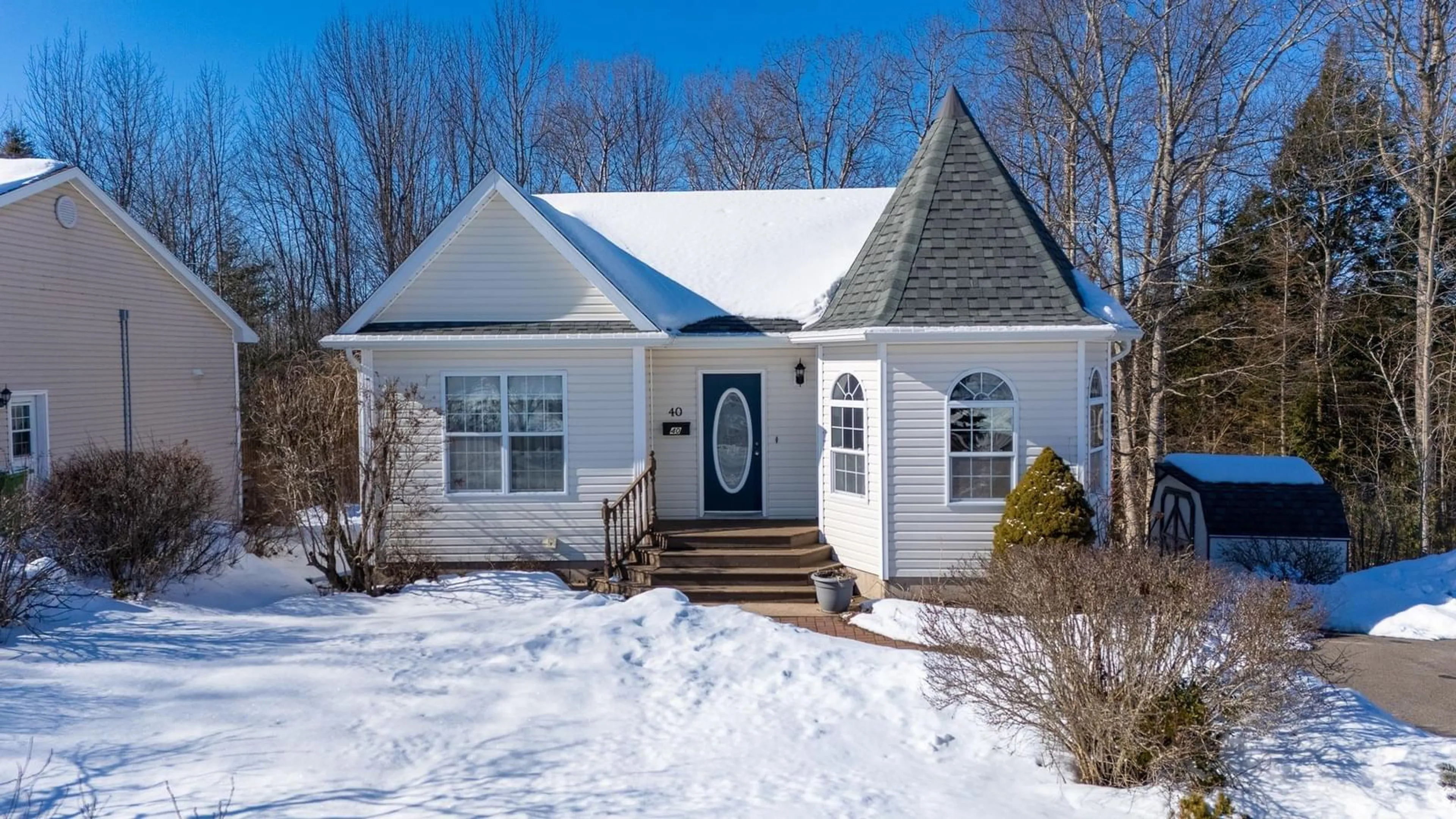 Home with vinyl exterior material, street for 40 Douglas St, New Minas Nova Scotia B4N 5P6