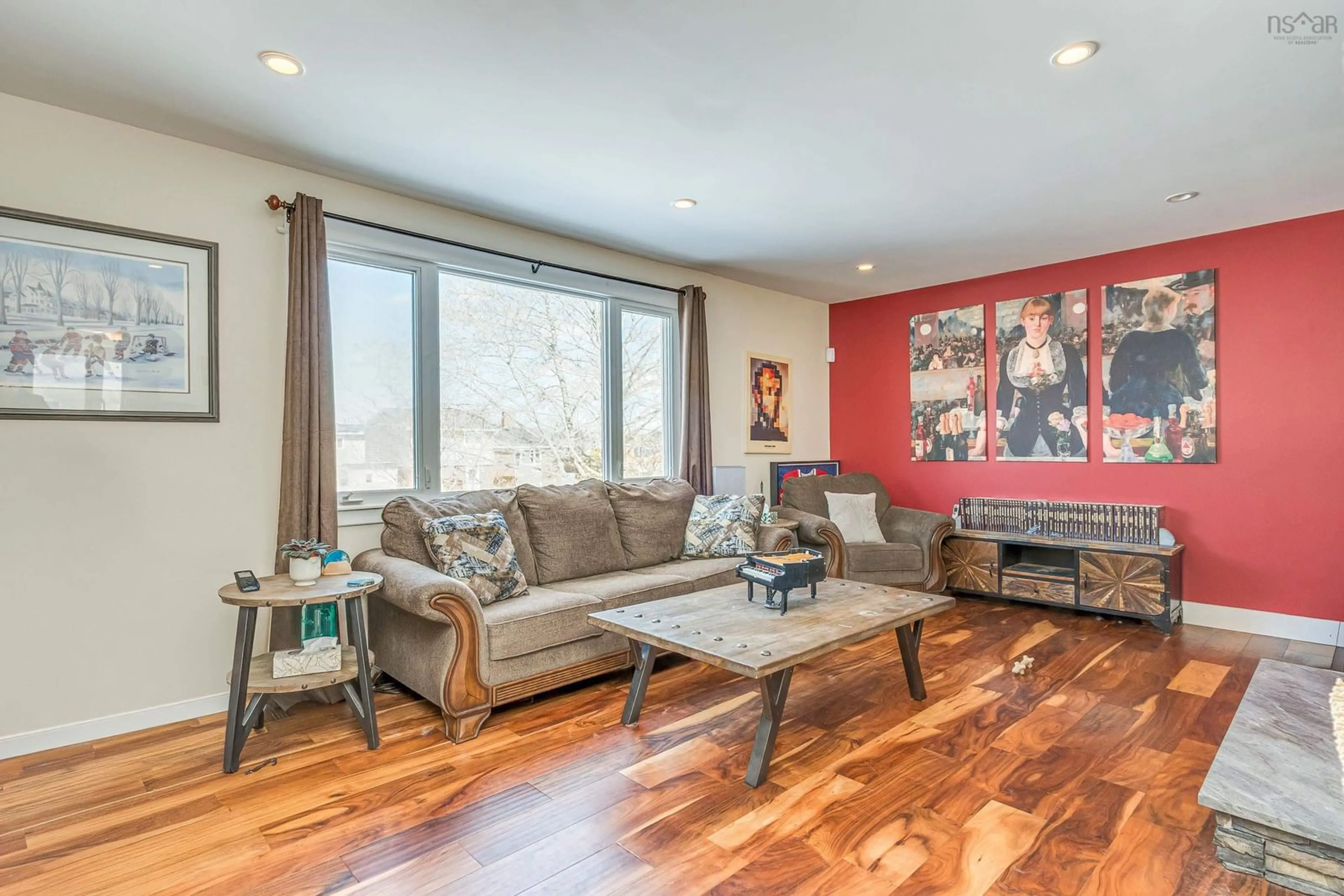 Living room with furniture, wood/laminate floor for 207 Colby Dr, Dartmouth Nova Scotia B2V 1K2