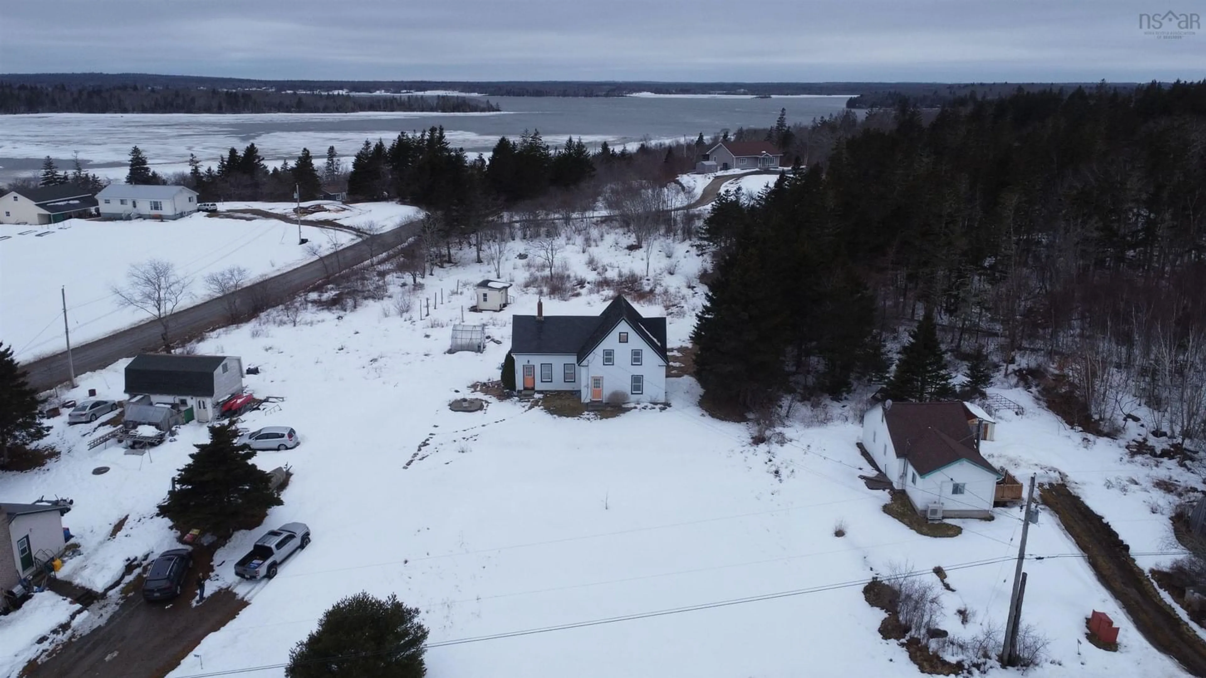 A pic from outside/outdoor area/front of a property/back of a property/a pic from drone, water/lake/river/ocean view for 128 Chemin Tour Des Buttes, Amiraults Hill Nova Scotia B0W 3M0