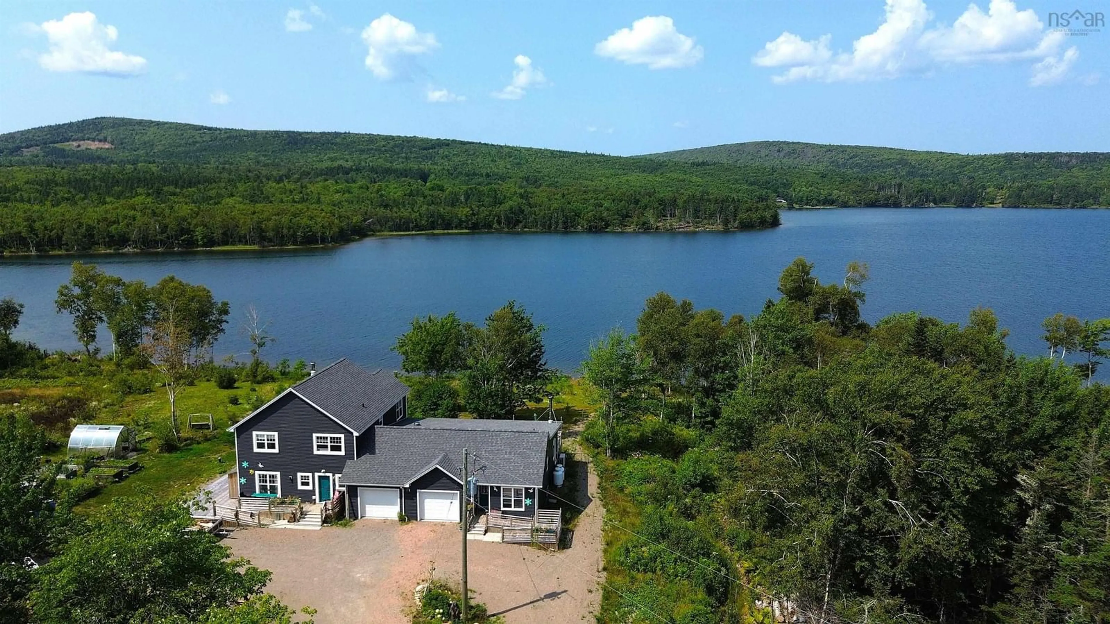 A pic from outside/outdoor area/front of a property/back of a property/a pic from drone, water/lake/river/ocean view for 242 Rodney Drive, Malagawatch Nova Scotia B0E 2Y0