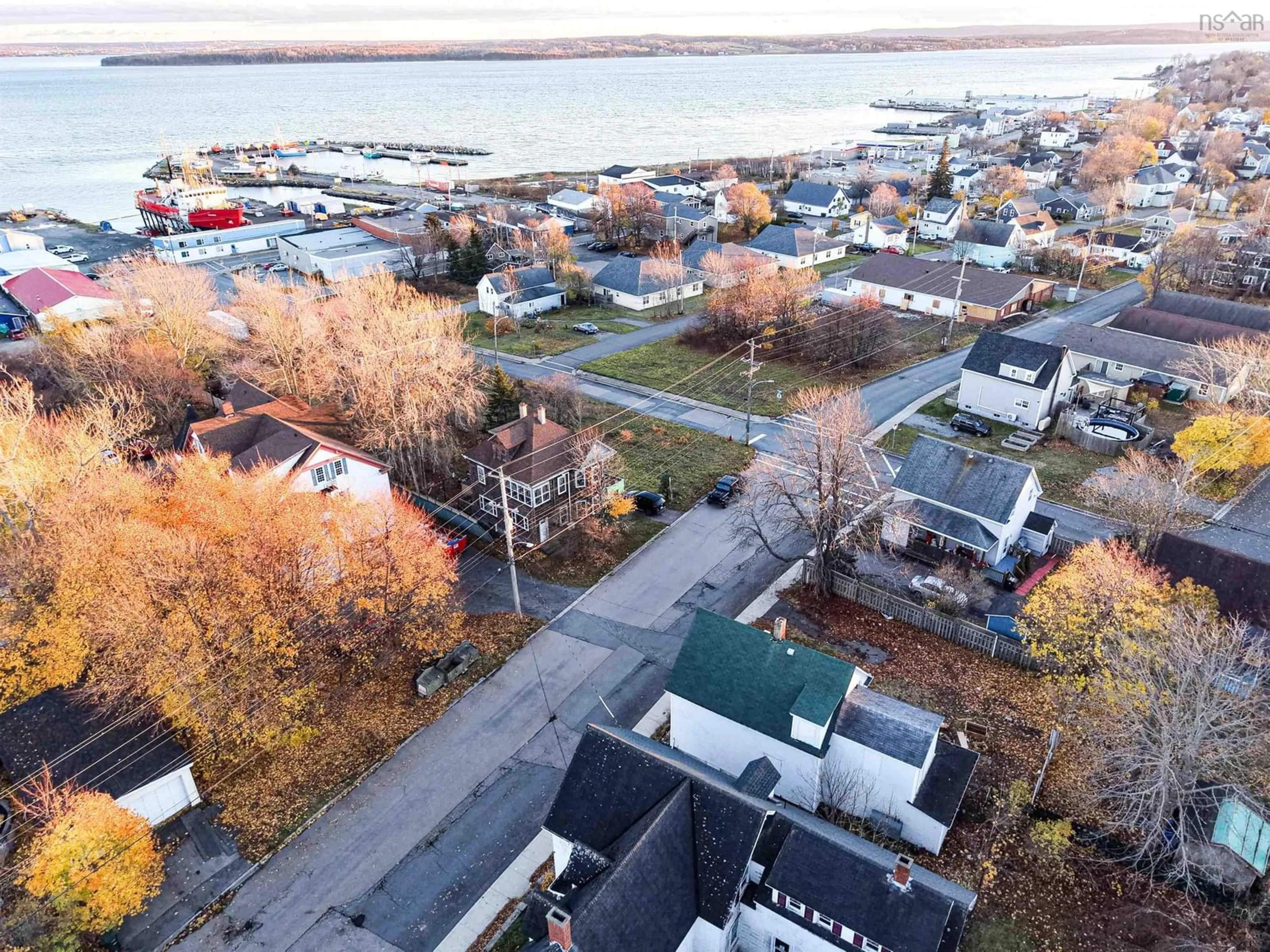 A pic from outside/outdoor area/front of a property/back of a property/a pic from drone, water/lake/river/ocean view for 72 Pleasant St, North Sydney Nova Scotia B2A 1L5
