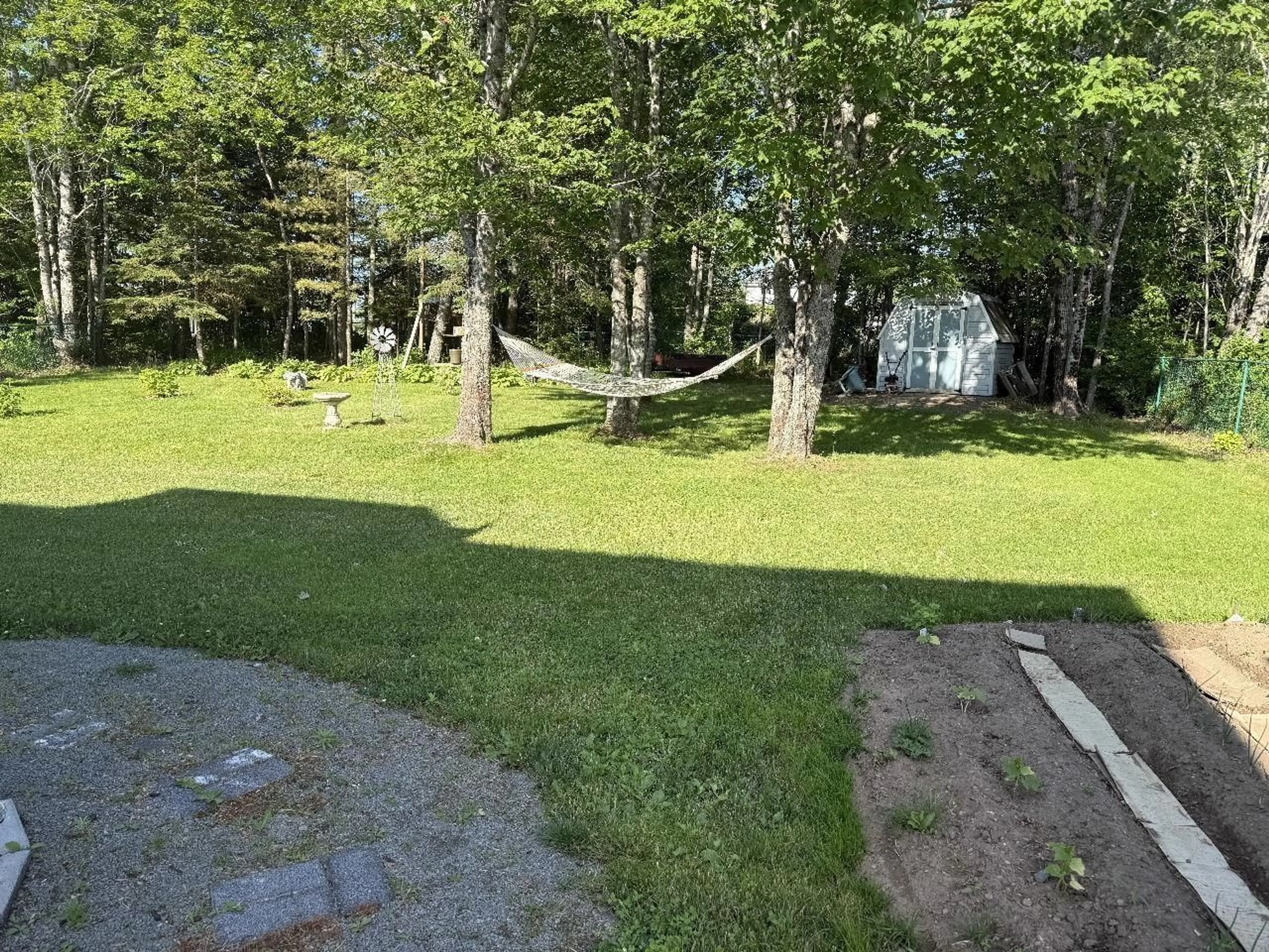 A pic from outside/outdoor area/front of a property/back of a property/a pic from drone, forest/trees view for 45 Shamrock Lane, Enfield Nova Scotia B2T 1C9