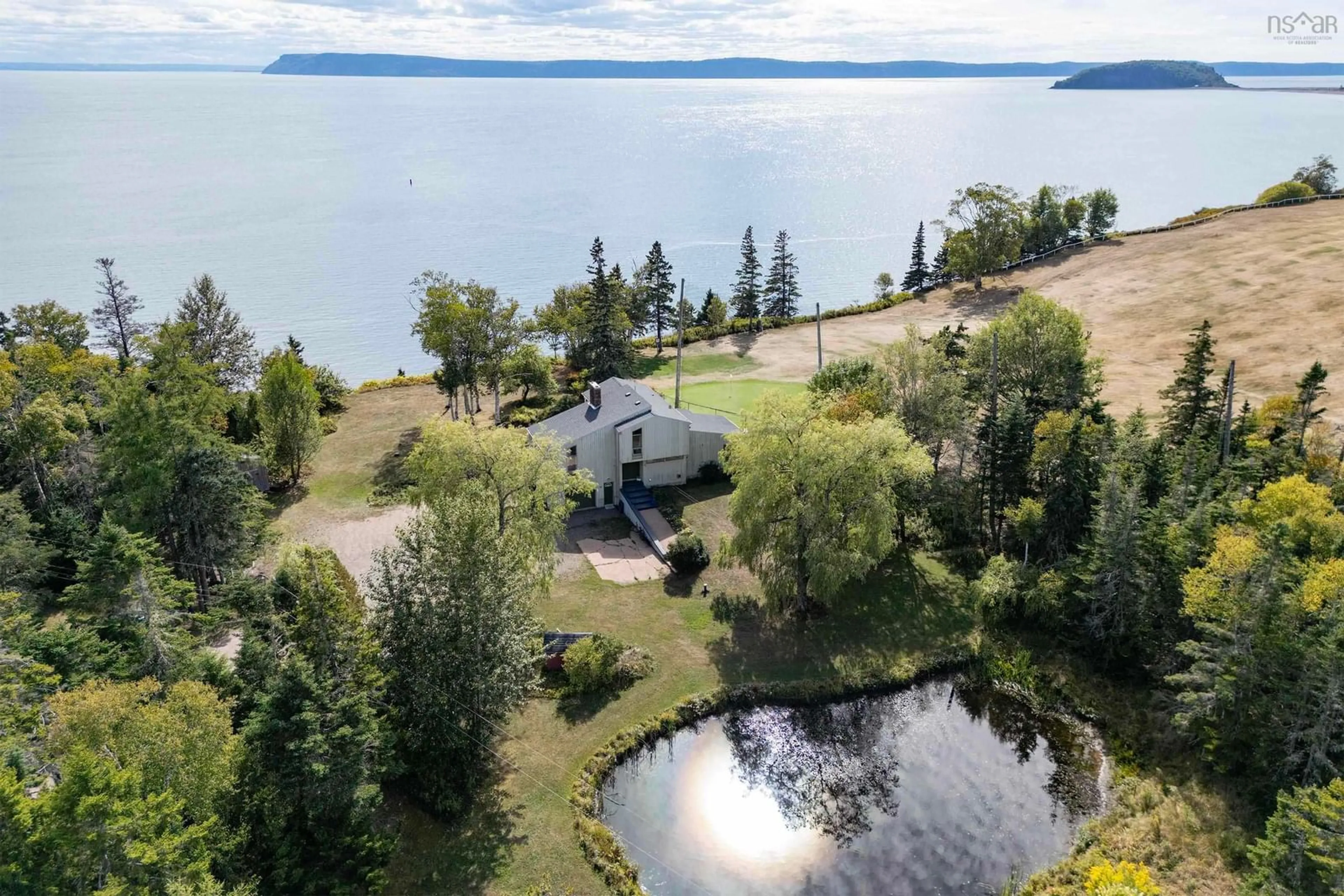 A pic from outside/outdoor area/front of a property/back of a property/a pic from drone, water/lake/river/ocean view for 3 Shore Lane, Greenhill Nova Scotia B0M 1S0