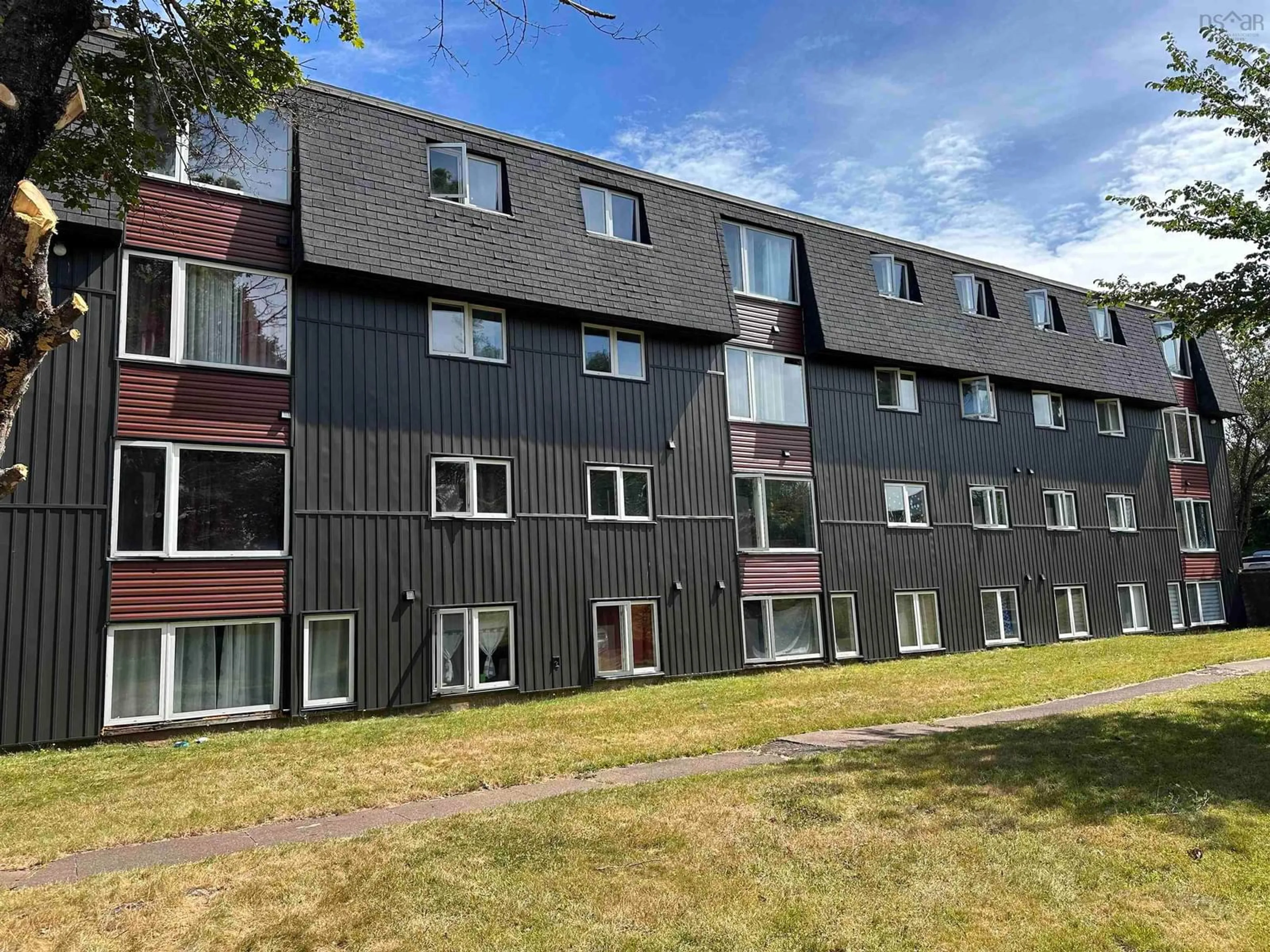 A pic from outside/outdoor area/front of a property/back of a property/a pic from drone, building for 99 Rupert St, Amherst Nova Scotia B4H 3S4