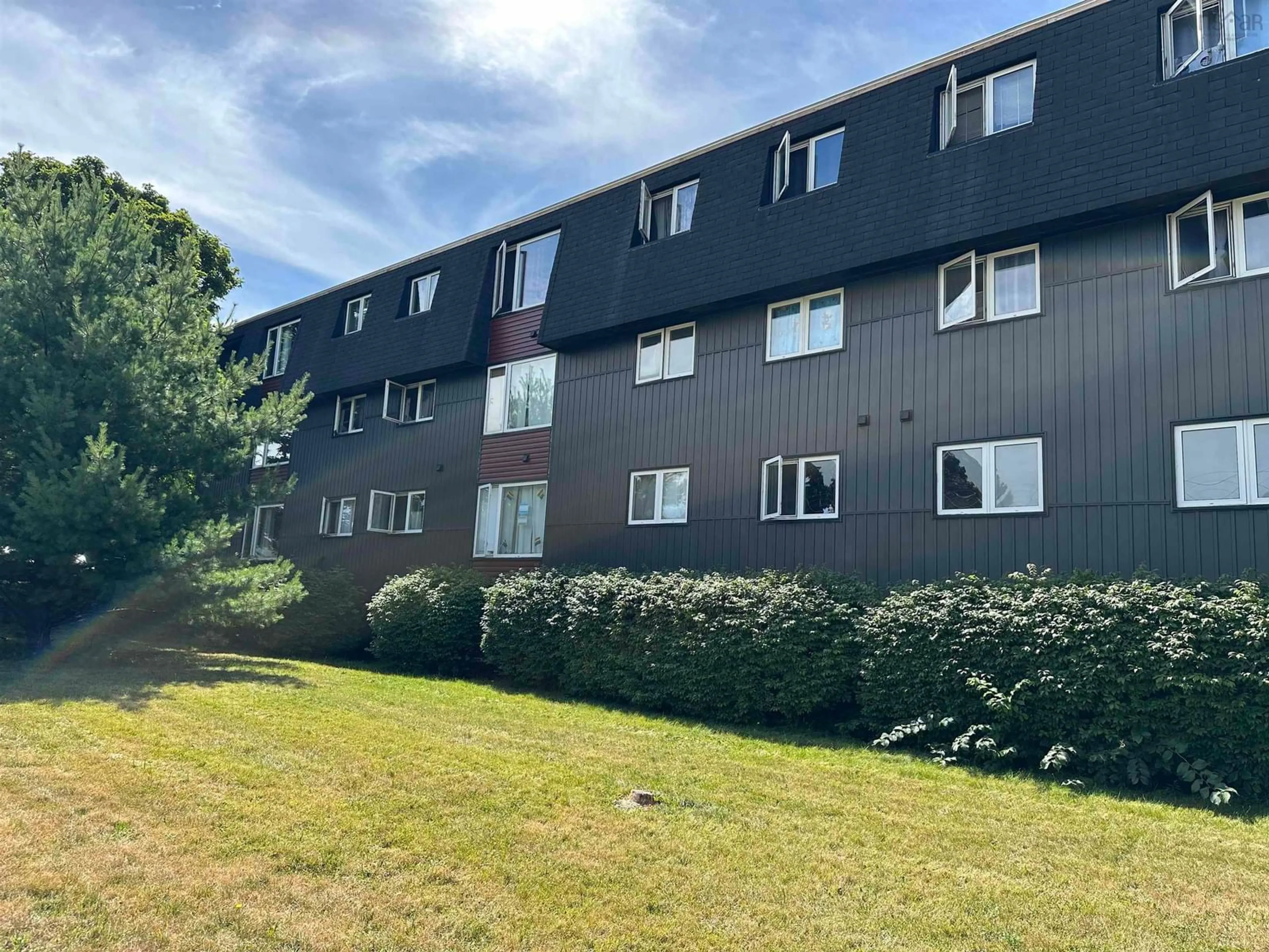 A pic from outside/outdoor area/front of a property/back of a property/a pic from drone, unknown for 99 Rupert St, Amherst Nova Scotia B4H 3S4