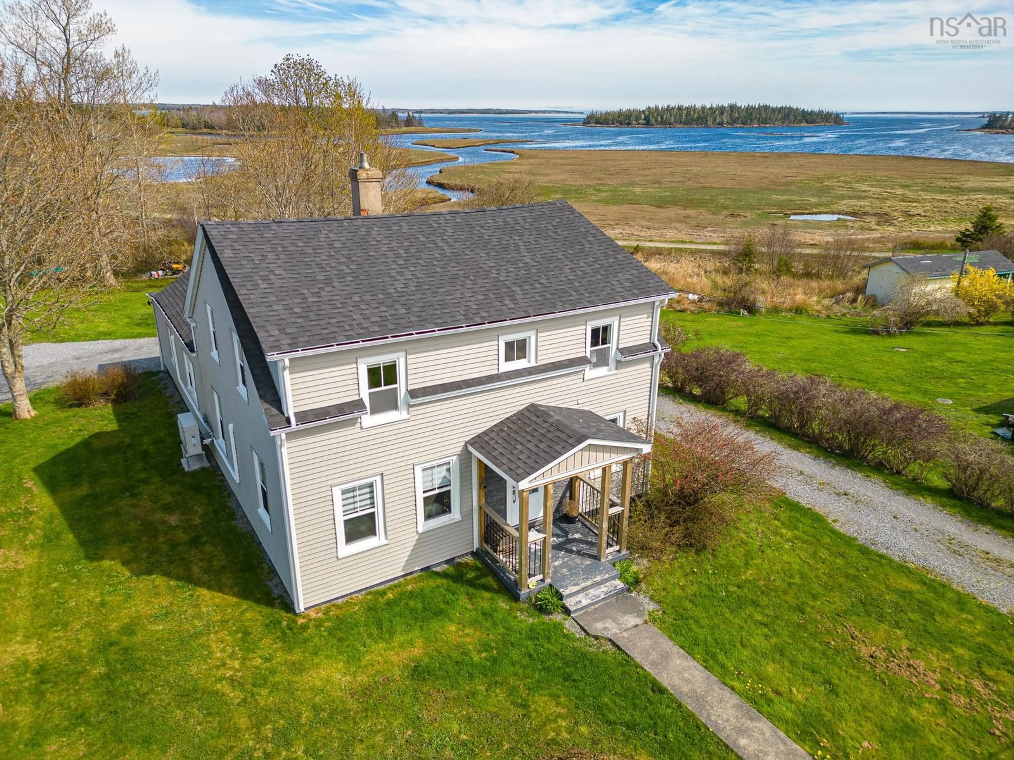 A pic from outside/outdoor area/front of a property/back of a property/a pic from drone, water/lake/river/ocean view for 2713 Highway 3, Barrington West Nova Scotia B0W 1E0