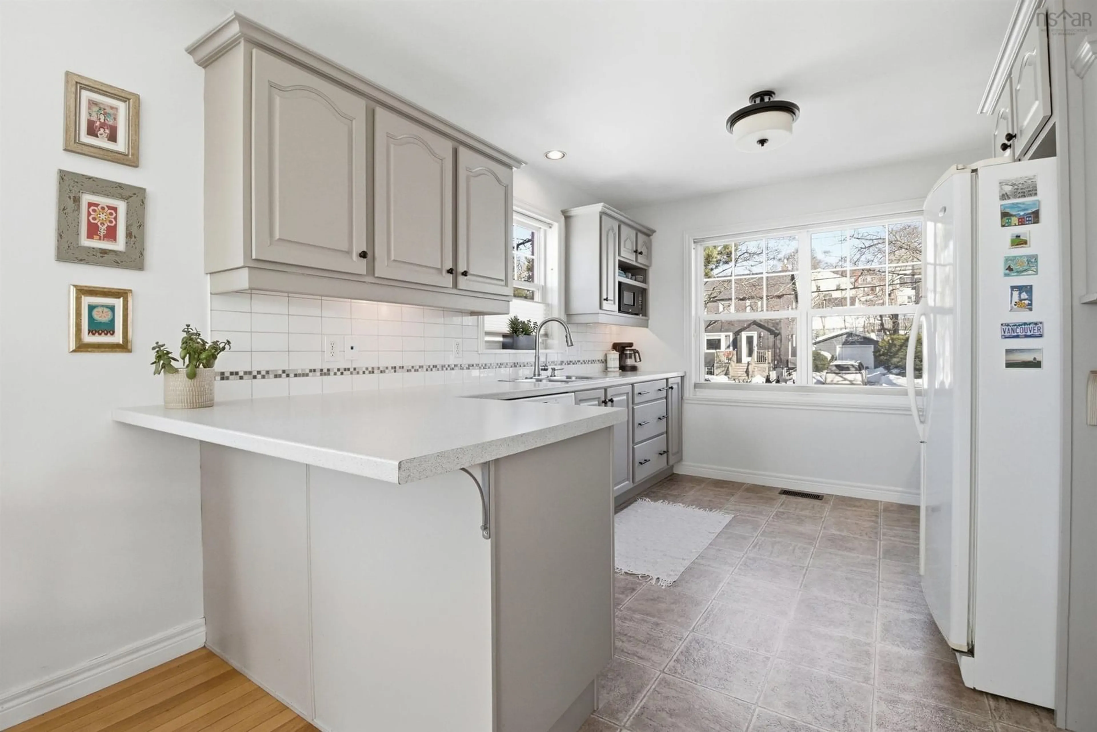 Open concept kitchen, ceramic/tile floor for 3790 Memorial Dr, Halifax Peninsula Nova Scotia B3K 6R6