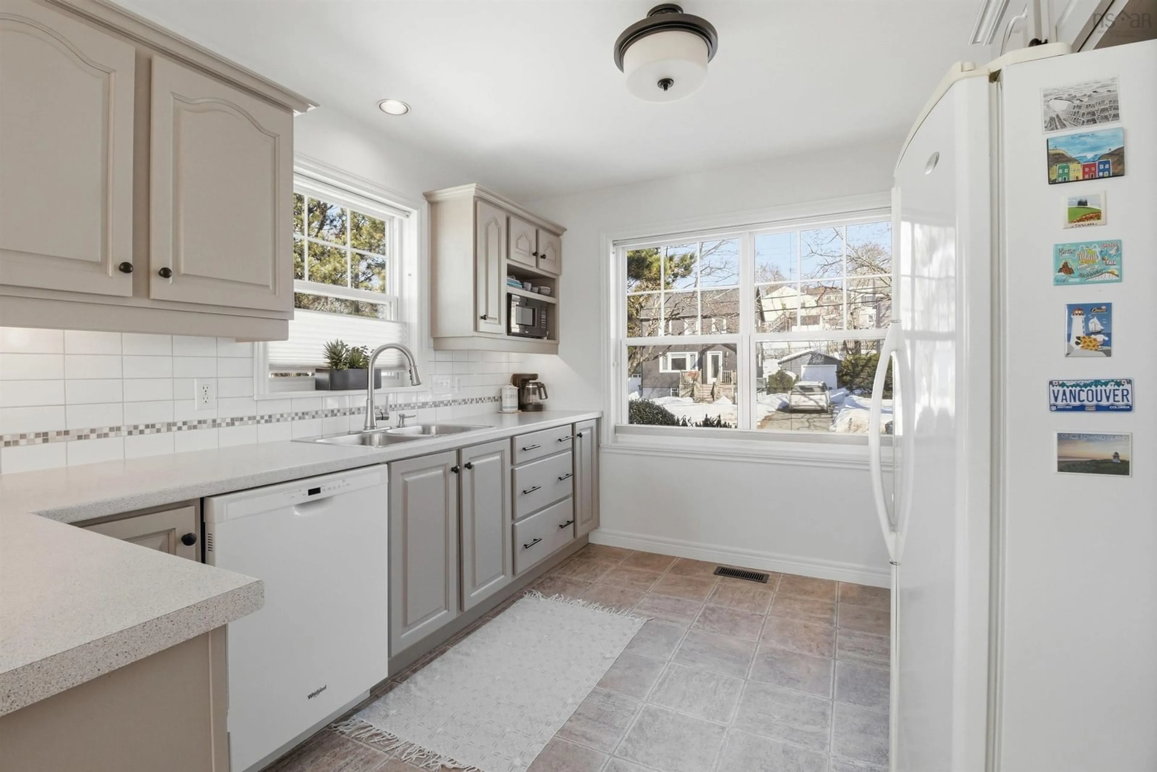 Open concept kitchen, ceramic/tile floor for 3790 Memorial Dr, Halifax Peninsula Nova Scotia B3K 6R6