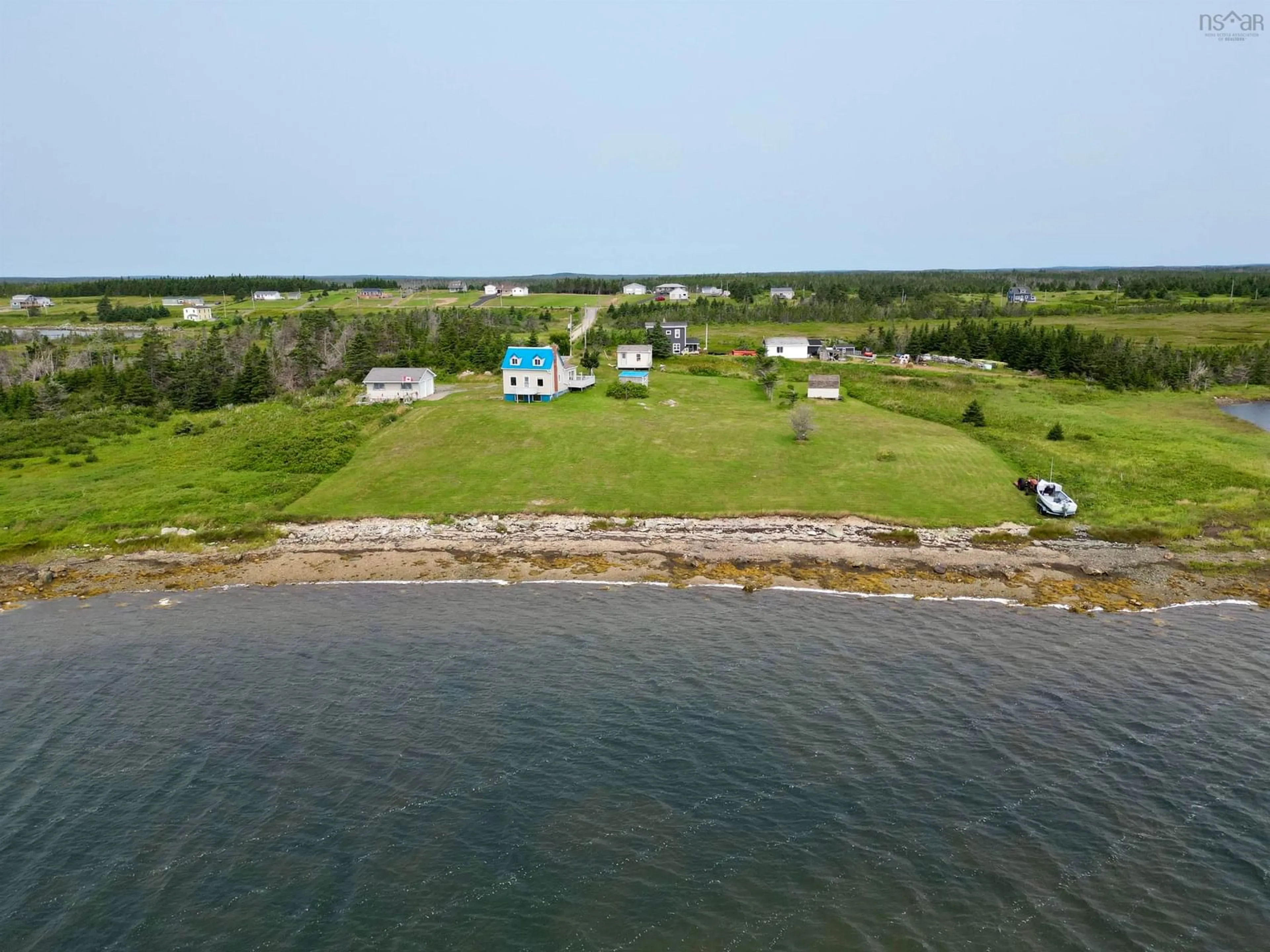 A pic from outside/outdoor area/front of a property/back of a property/a pic from drone, water/lake/river/ocean view for 9684 St. Peter's Fourchu Rd., Fourchu Nova Scotia B2J 1A5