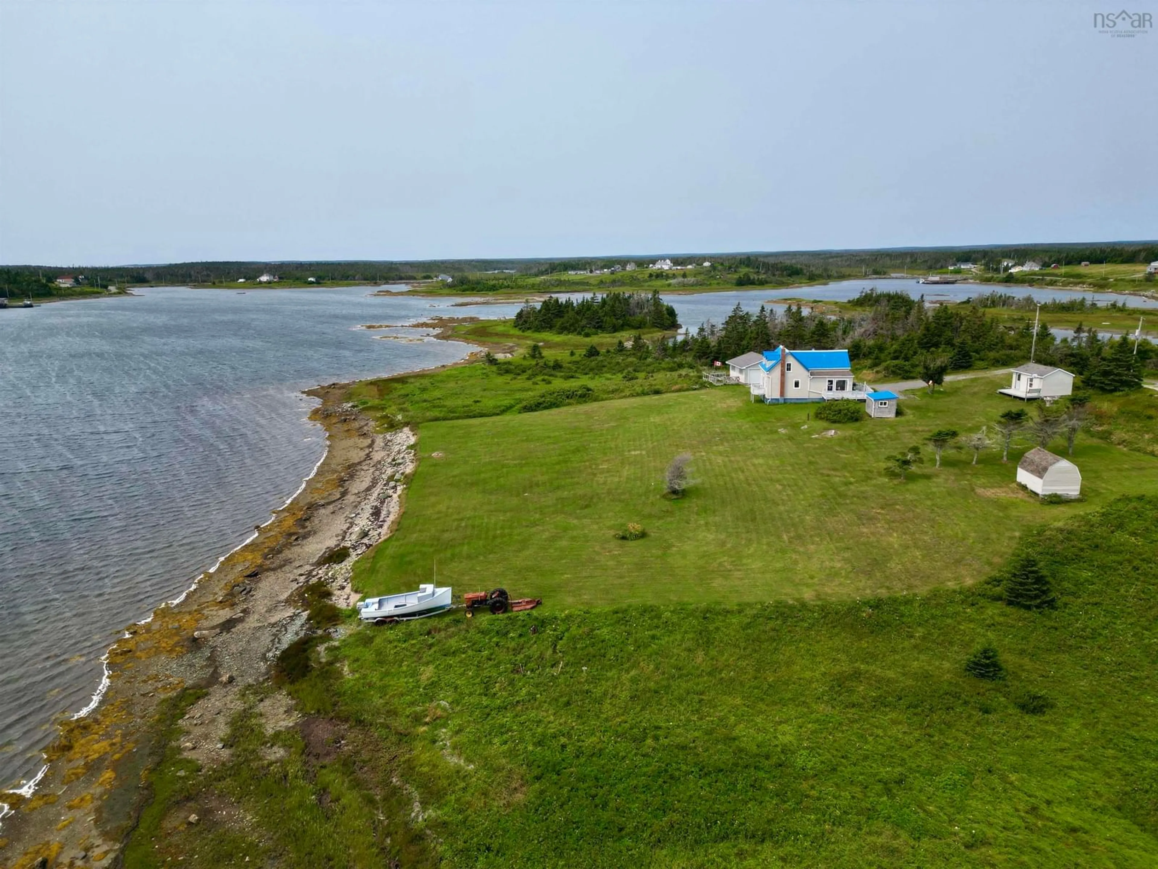 A pic from outside/outdoor area/front of a property/back of a property/a pic from drone, water/lake/river/ocean view for 9684 St. Peter's Fourchu Rd., Fourchu Nova Scotia B2J 1A5