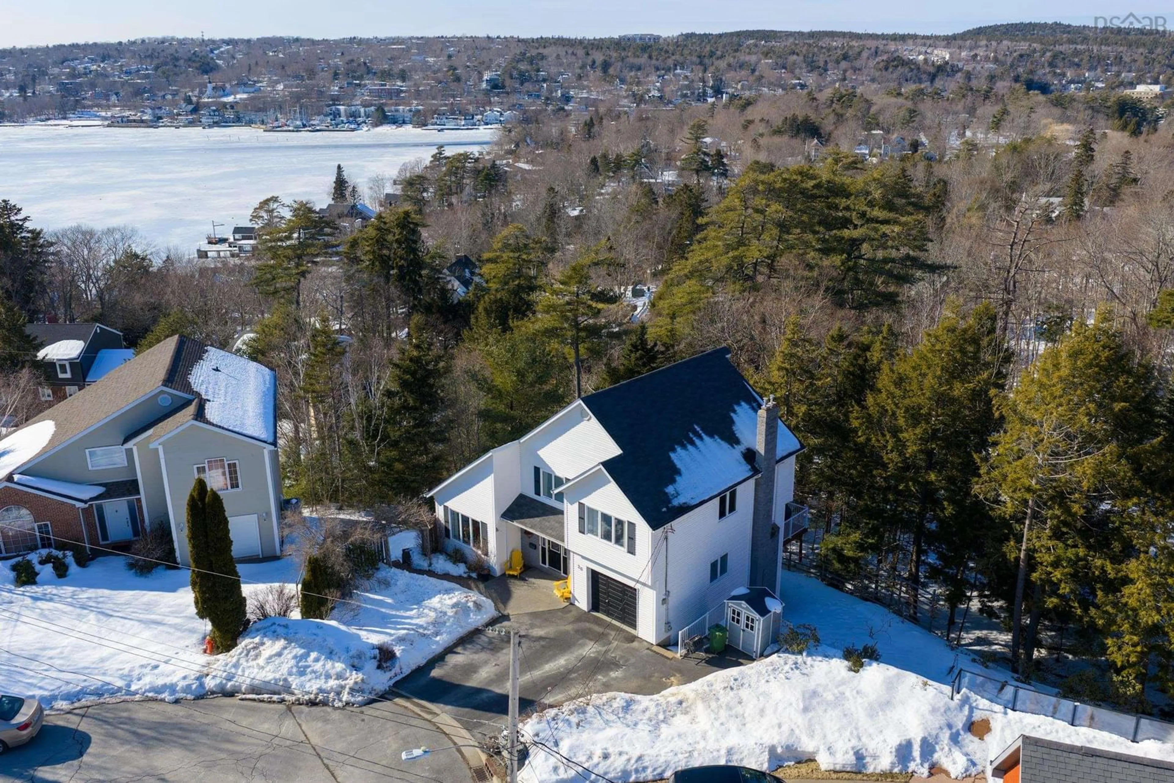 A pic from outside/outdoor area/front of a property/back of a property/a pic from drone, water/lake/river/ocean view for 20 Fleet Crt, Bedford Nova Scotia B4A 4J8
