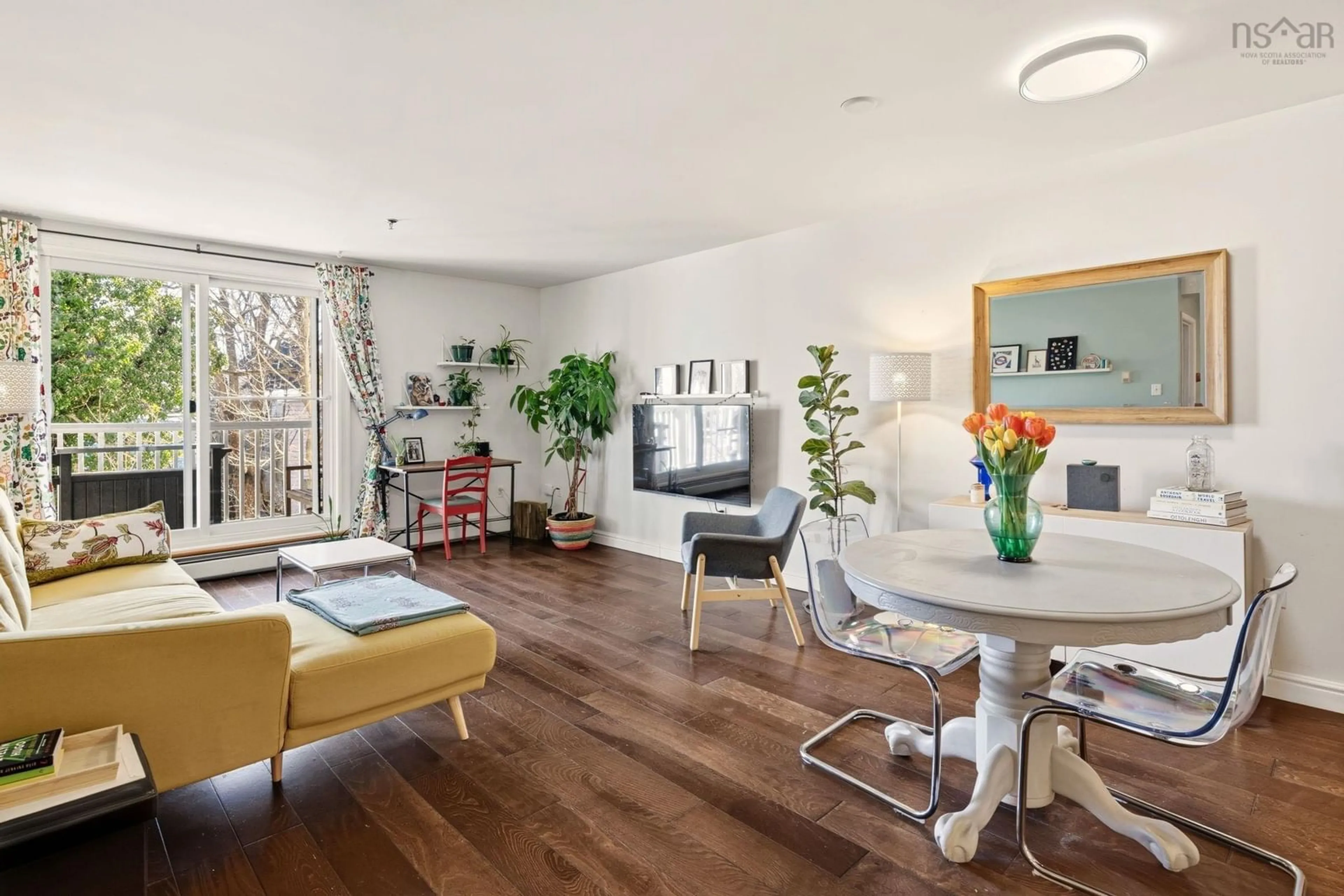 Living room with furniture, wood/laminate floor for 5230 Tobin St #209, Halifax Nova Scotia B3H 1S2