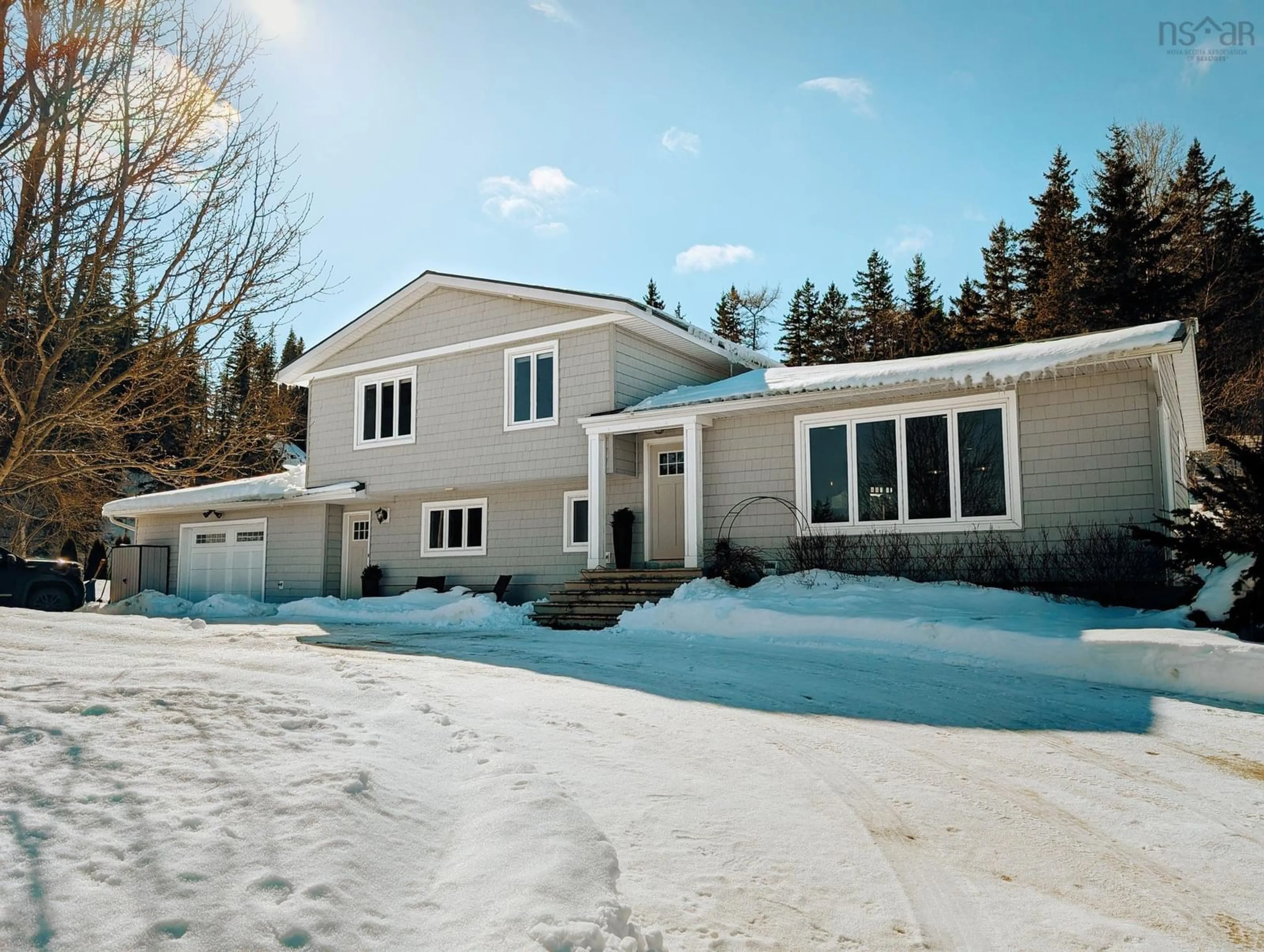 Home with vinyl exterior material, street for 10055 19 Hwy, Southwest Mabou Nova Scotia B0E 2W0