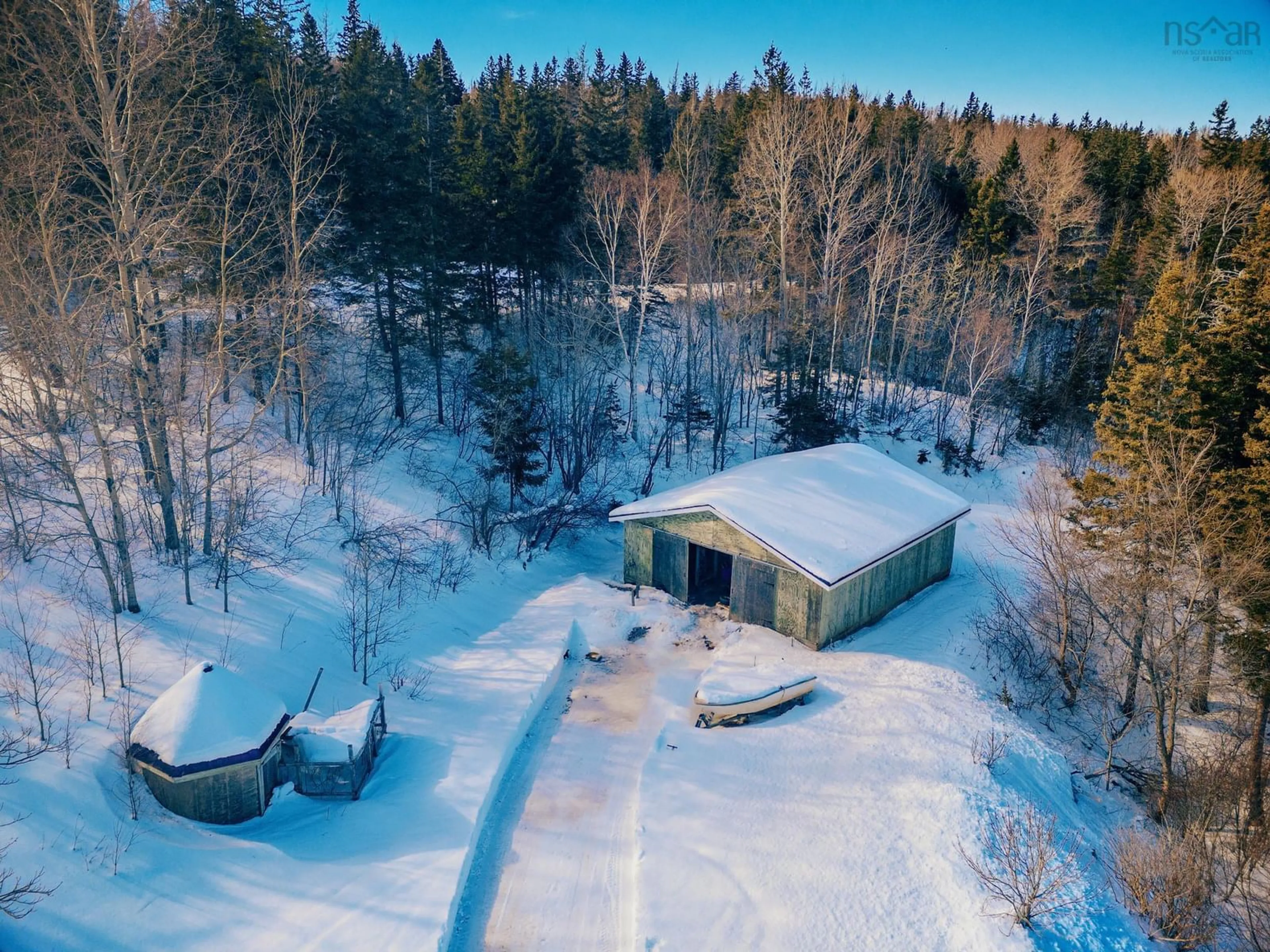 A pic from outside/outdoor area/front of a property/back of a property/a pic from drone, forest/trees view for 10055 19 Hwy, Southwest Mabou Nova Scotia B0E 2W0