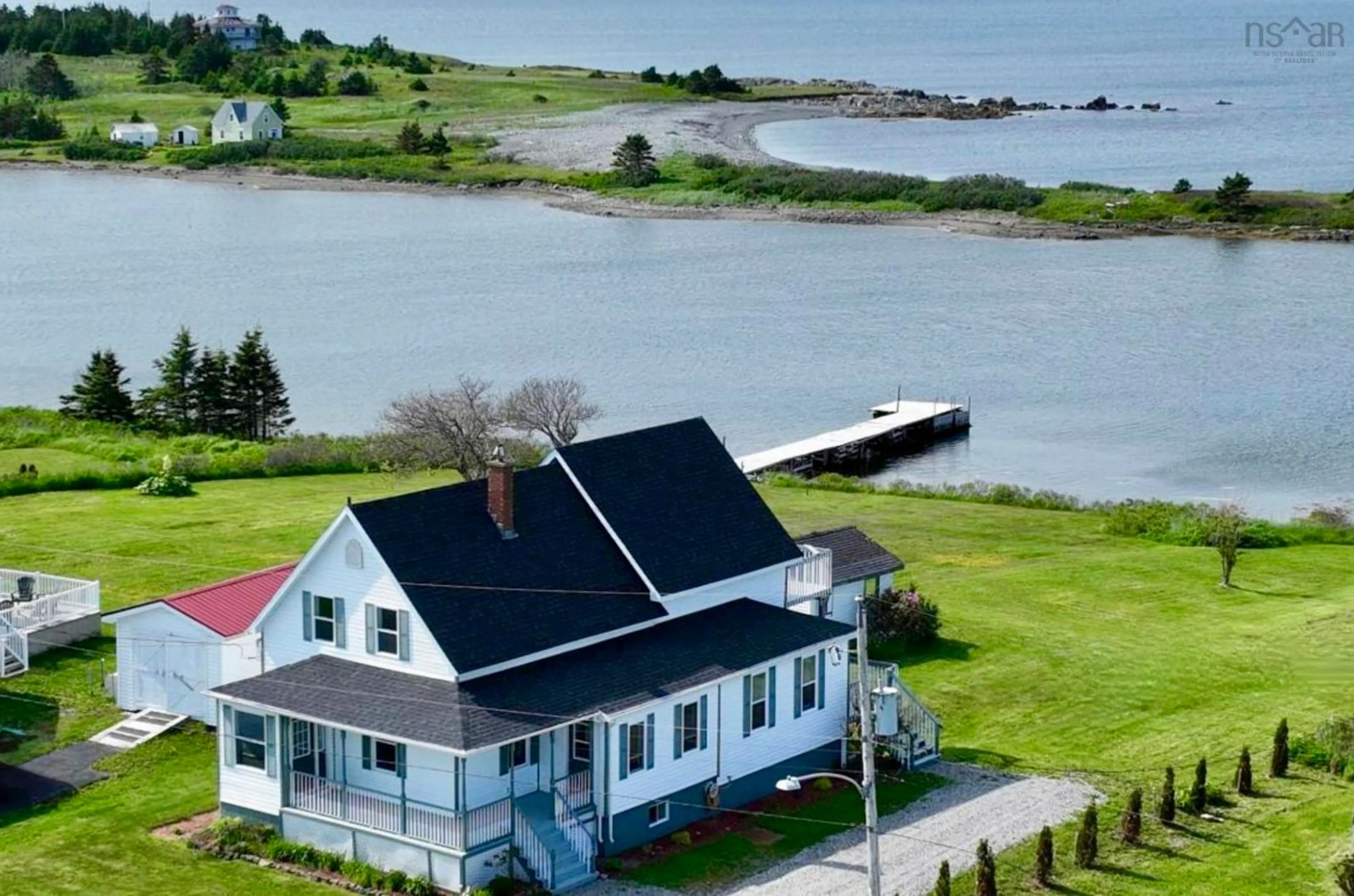 A pic from outside/outdoor area/front of a property/back of a property/a pic from drone, water/lake/river/ocean view for 36 Seaview Dr, Gabarus Village Nova Scotia B1K 3T4